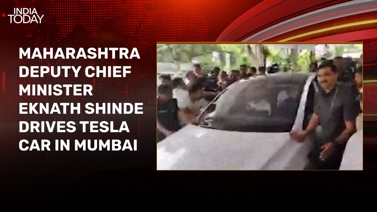 Watch: Eknath Shinde drives Tesla car outside Vidhan Bhavan in Mumbai