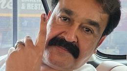 Video: Mohanlal queues up at polling booth, casts his vote in Keralam election Mohanlal's photo