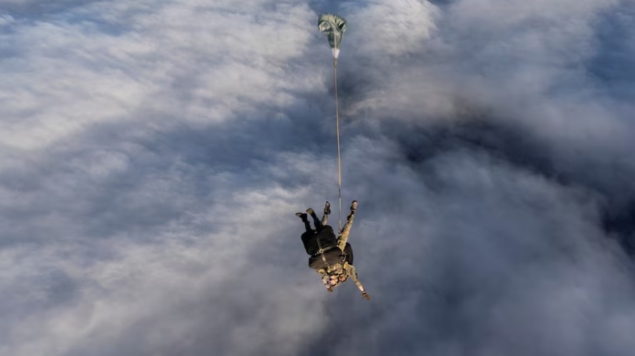 Video: UK paratrooper's parachute drop on remote island to aid hantavirus patient
