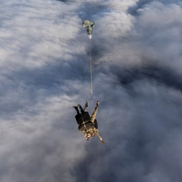 Video: UK paratrooper's parachute drop on remote island to aid hantavirus patient