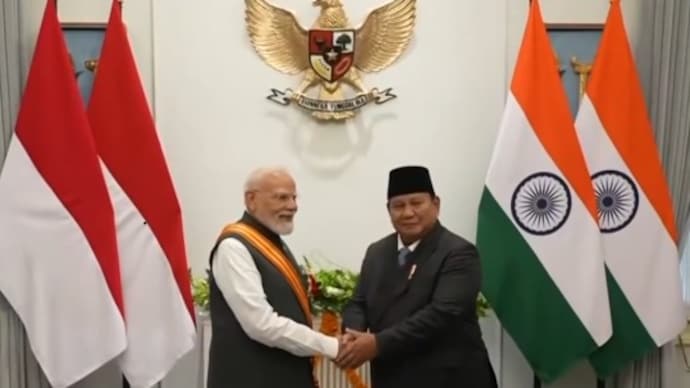 PM Modi conferred with Indonesia's highest honour; China conducts rare pacific submarine missile test; more