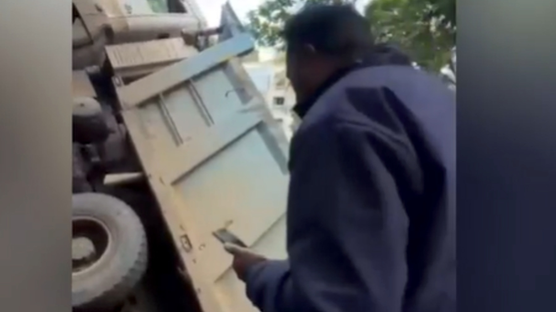 Video: Nashik truck carrying gravel to fill potholes falls into one