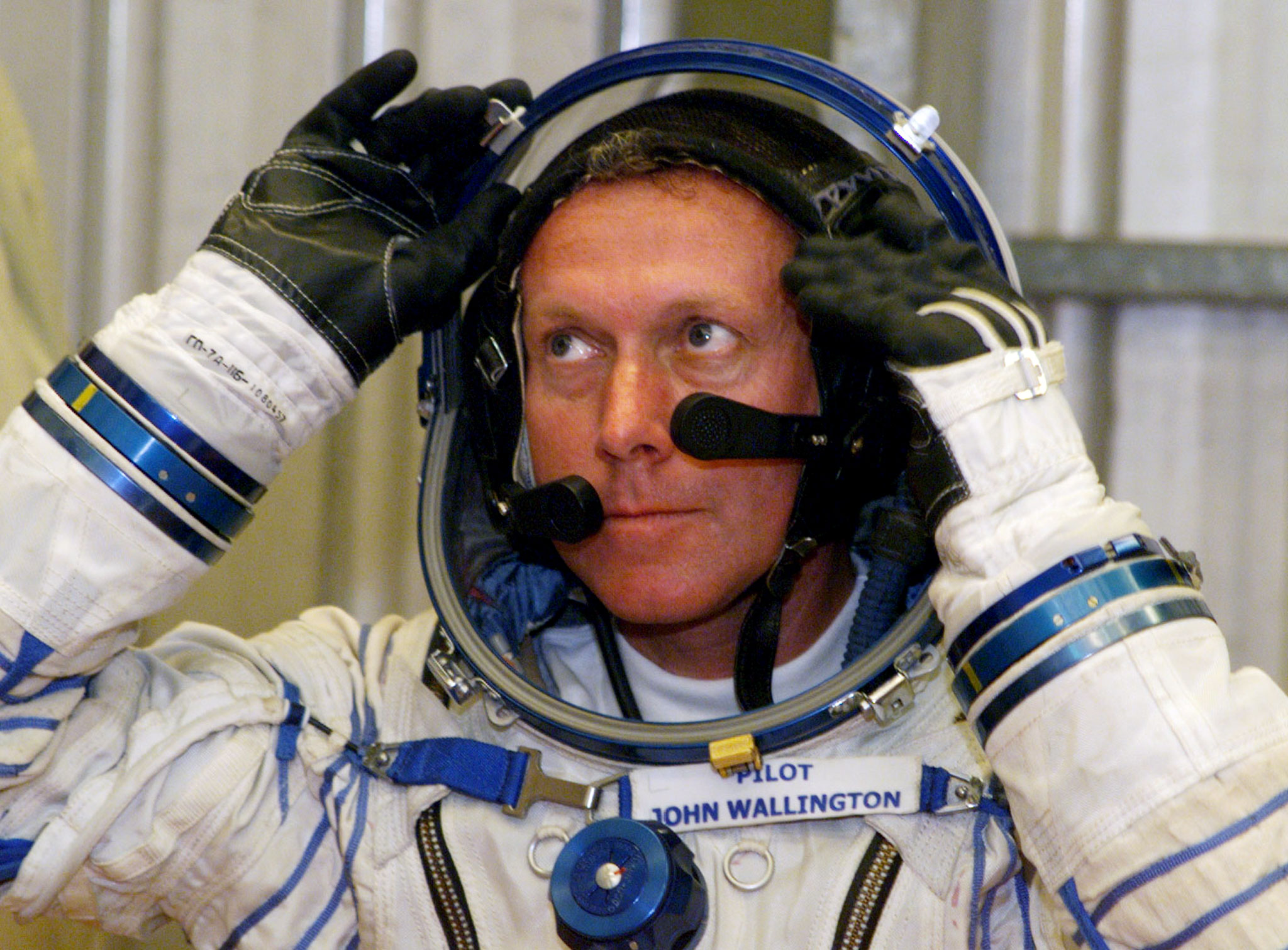 Australian balloon pilot John Wallington of Canberra fits his custom made Russian space suit. (Photo: Reuters)