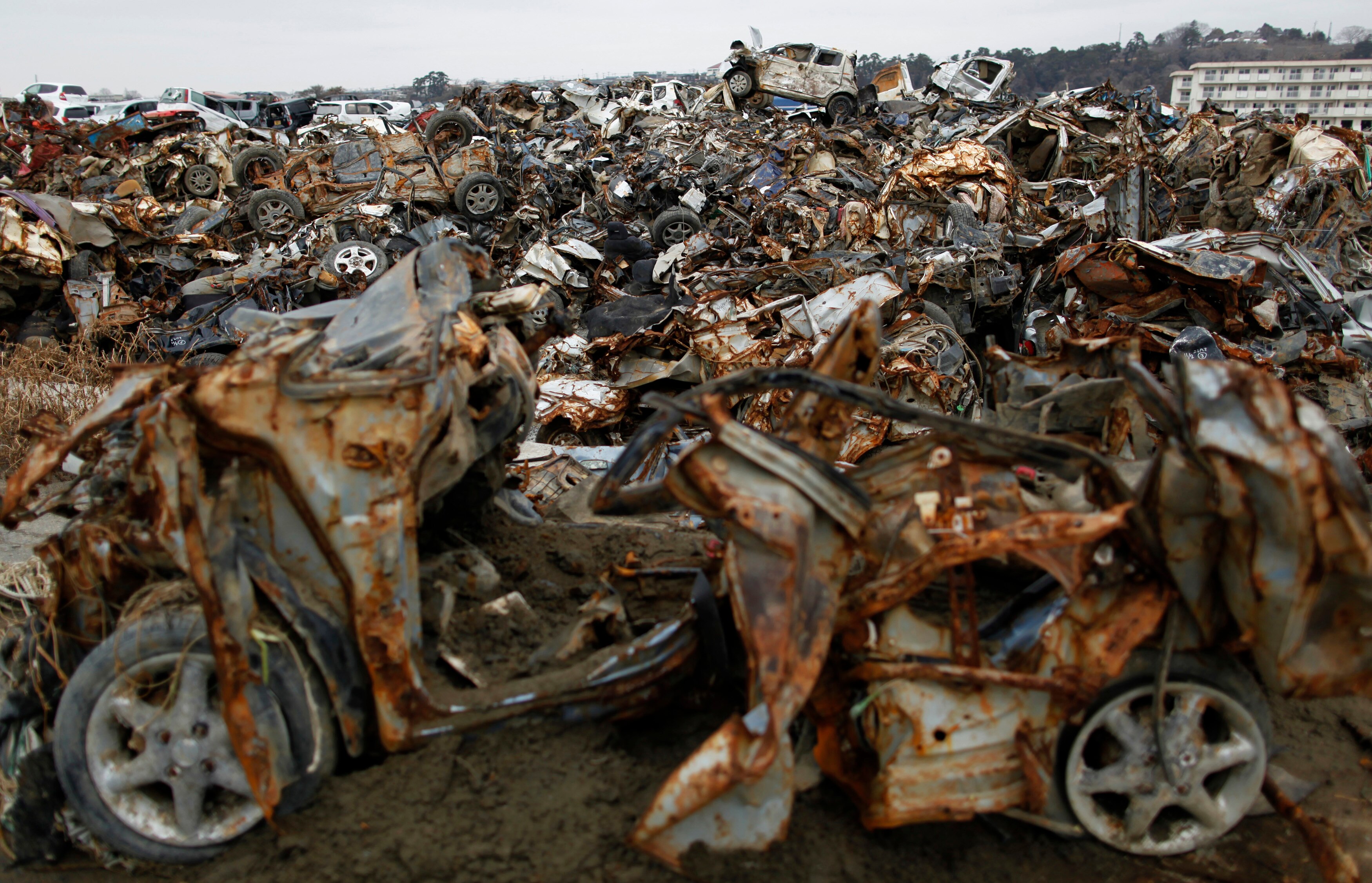 Cars destroyed by the 2011 earthquake and tsunami are seen at a devastated area in Miyagi prefecture. (Photo: Reuters)