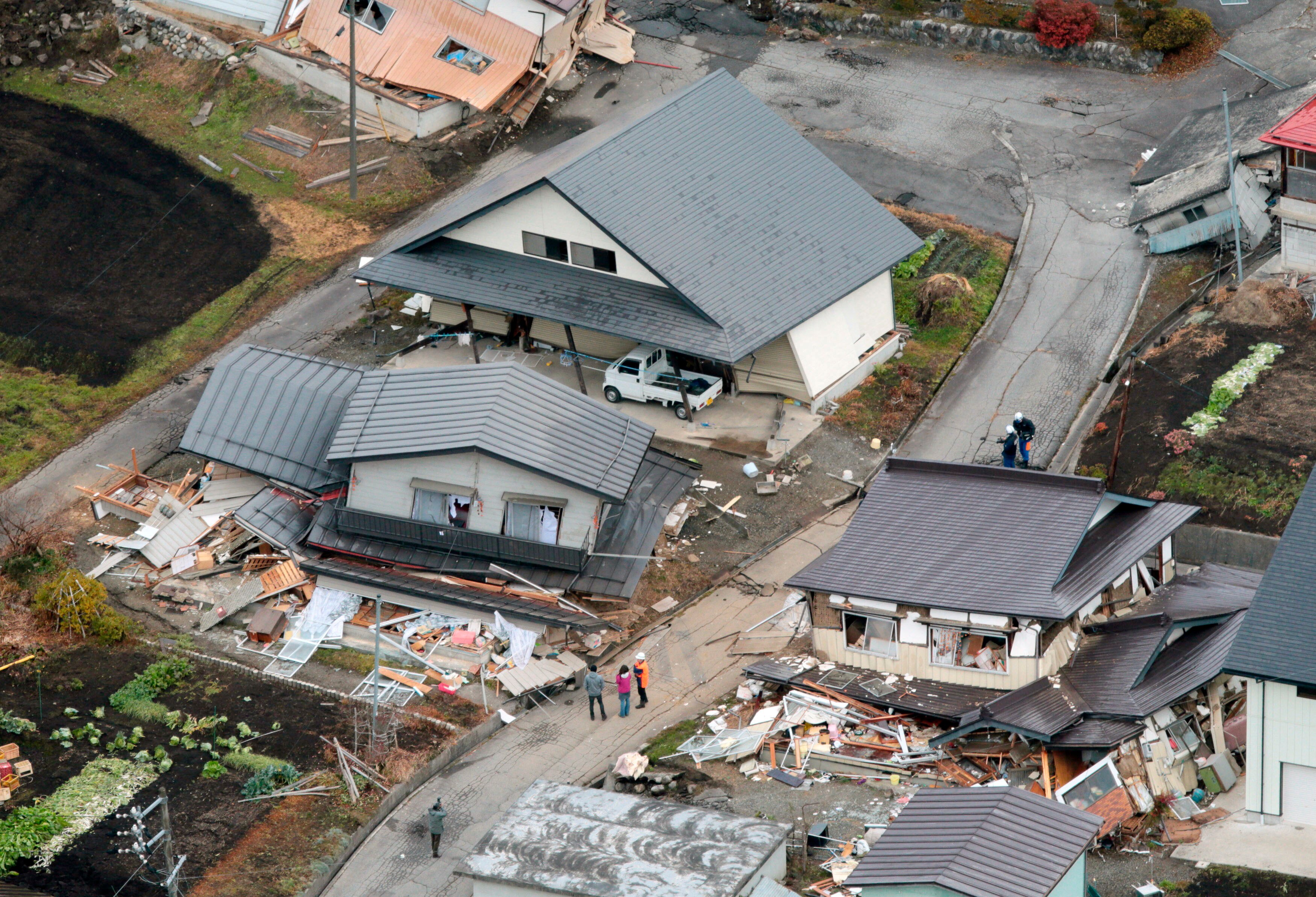 An aerial view shows collapsed houses after an earthquake in Hakuba town, Nagano prefecture, in 2014. (Photo: Reuters)
