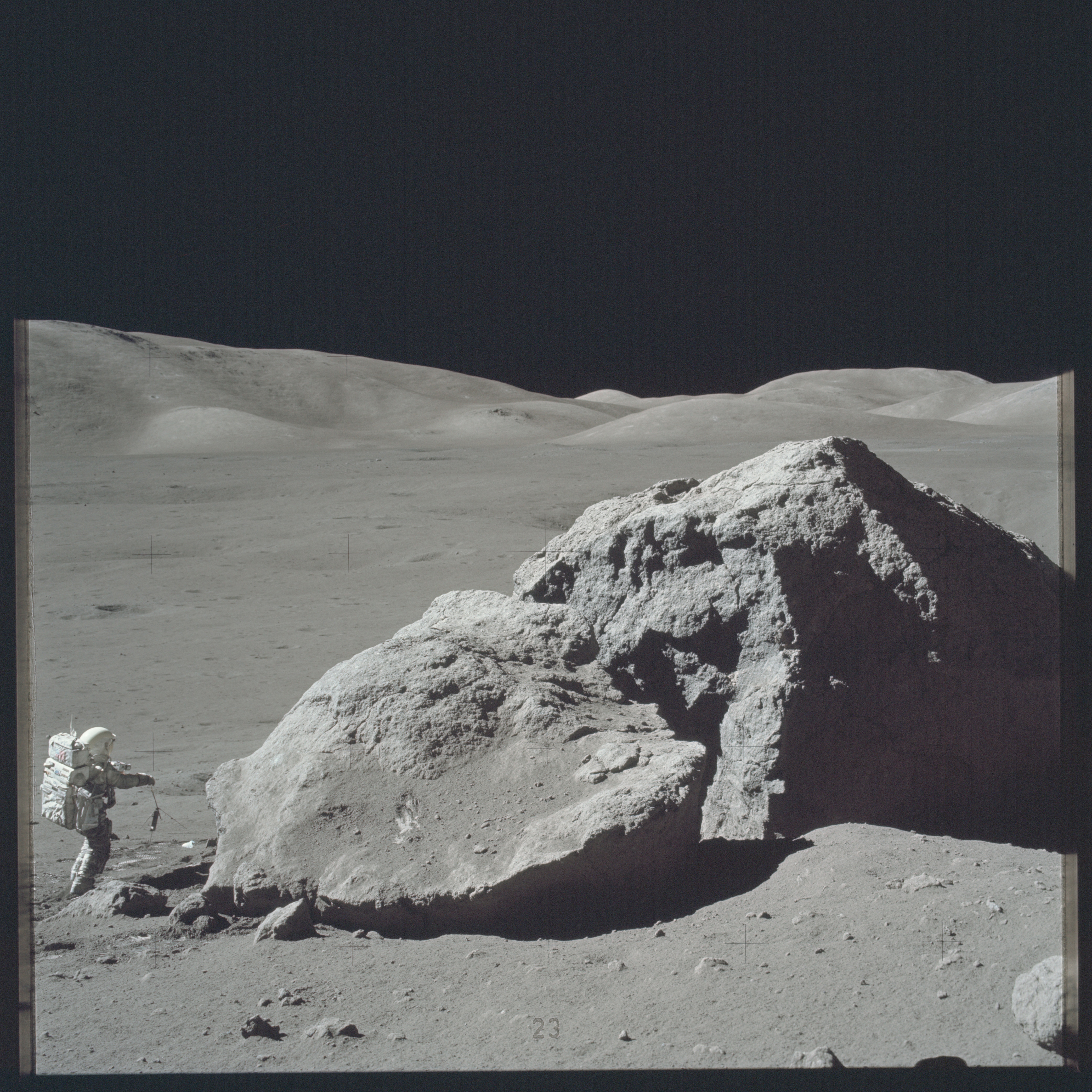 Scientist-astronaut Harrison Schmitt is pictured standing next to a boulder on Moon. (Photo: Reuters)