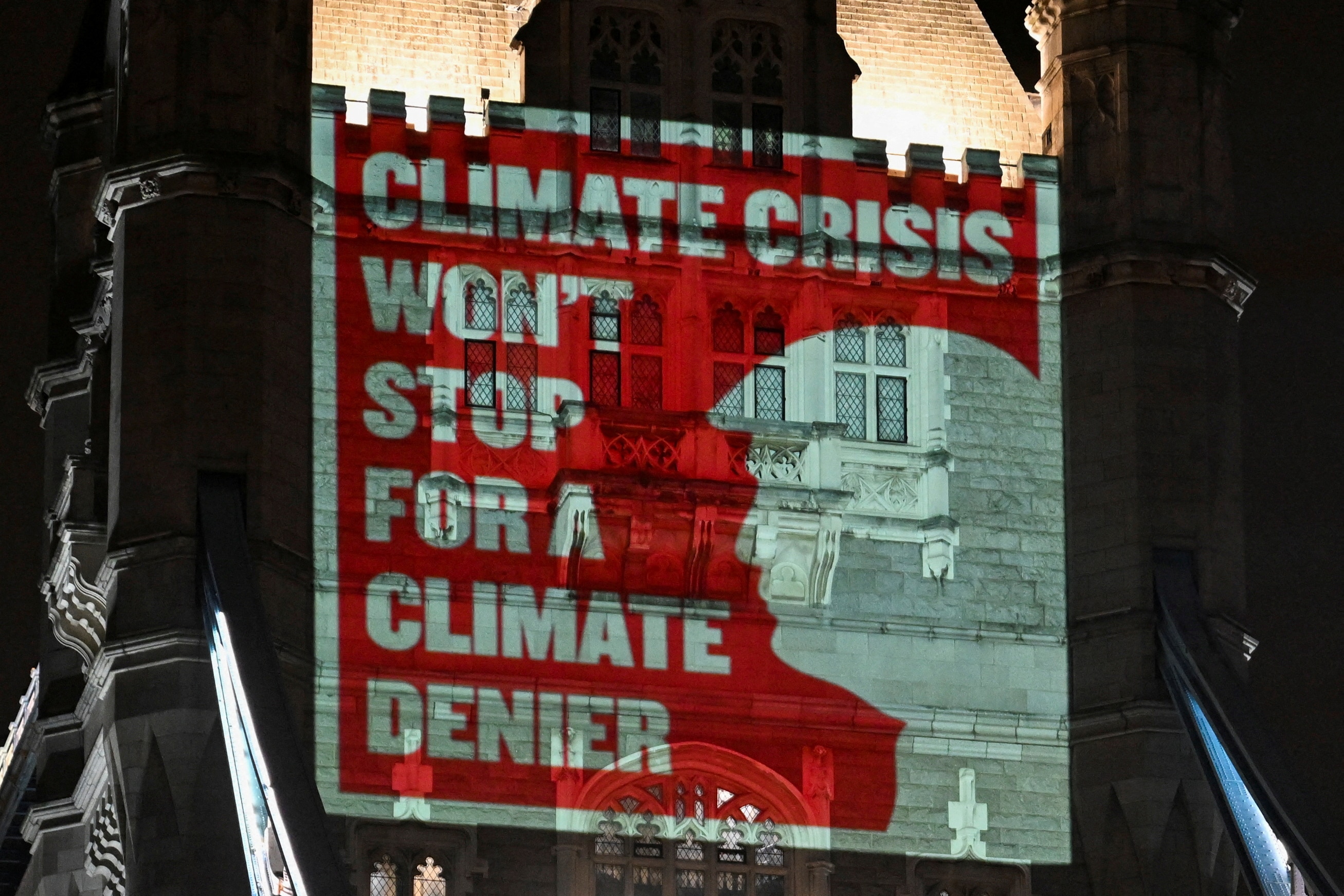 Climate activists project a message onto Tower Bridge in London, UK. (Photo: Reuters)