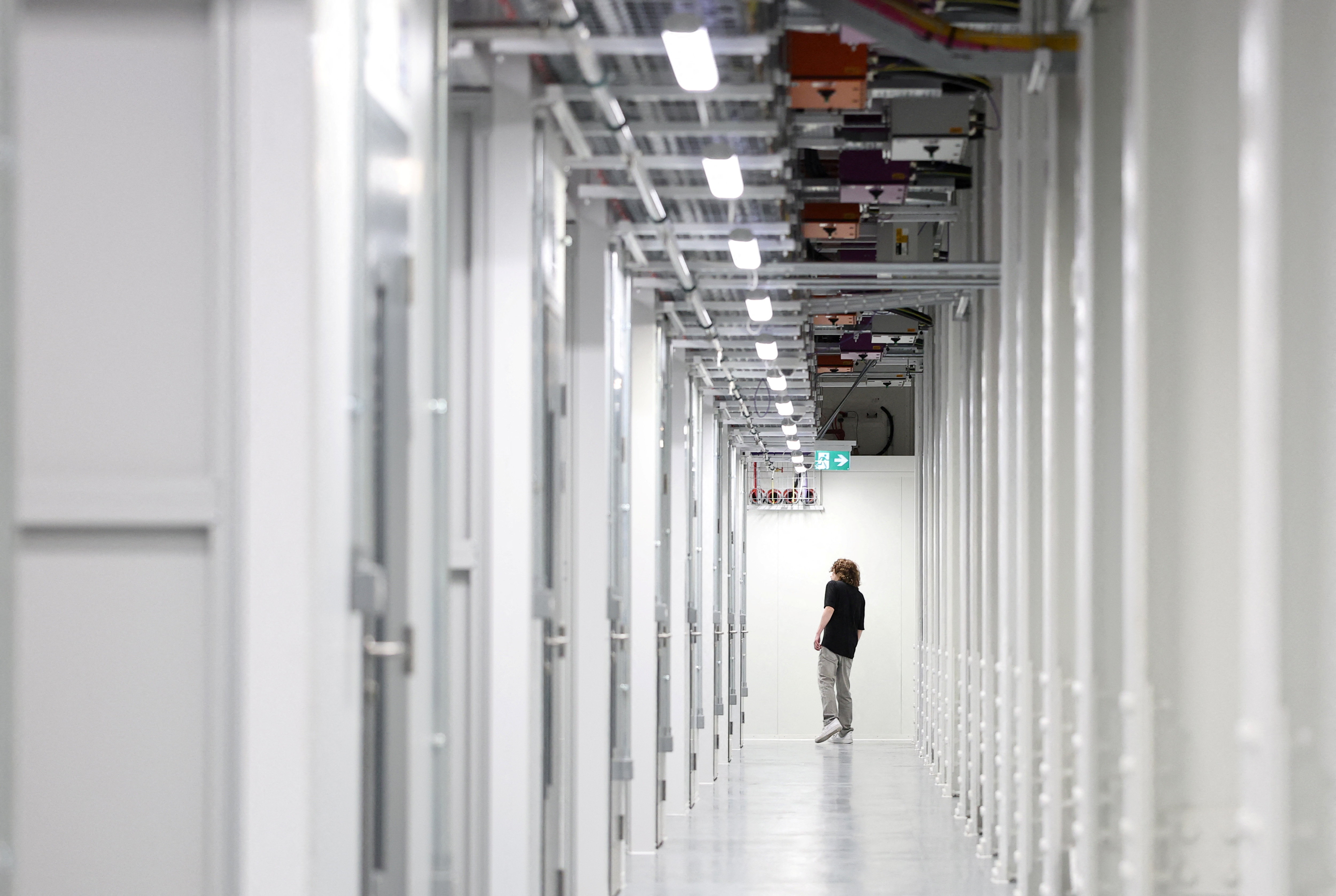 An IT technician walks inside a data centre. (Photo: Reuters)