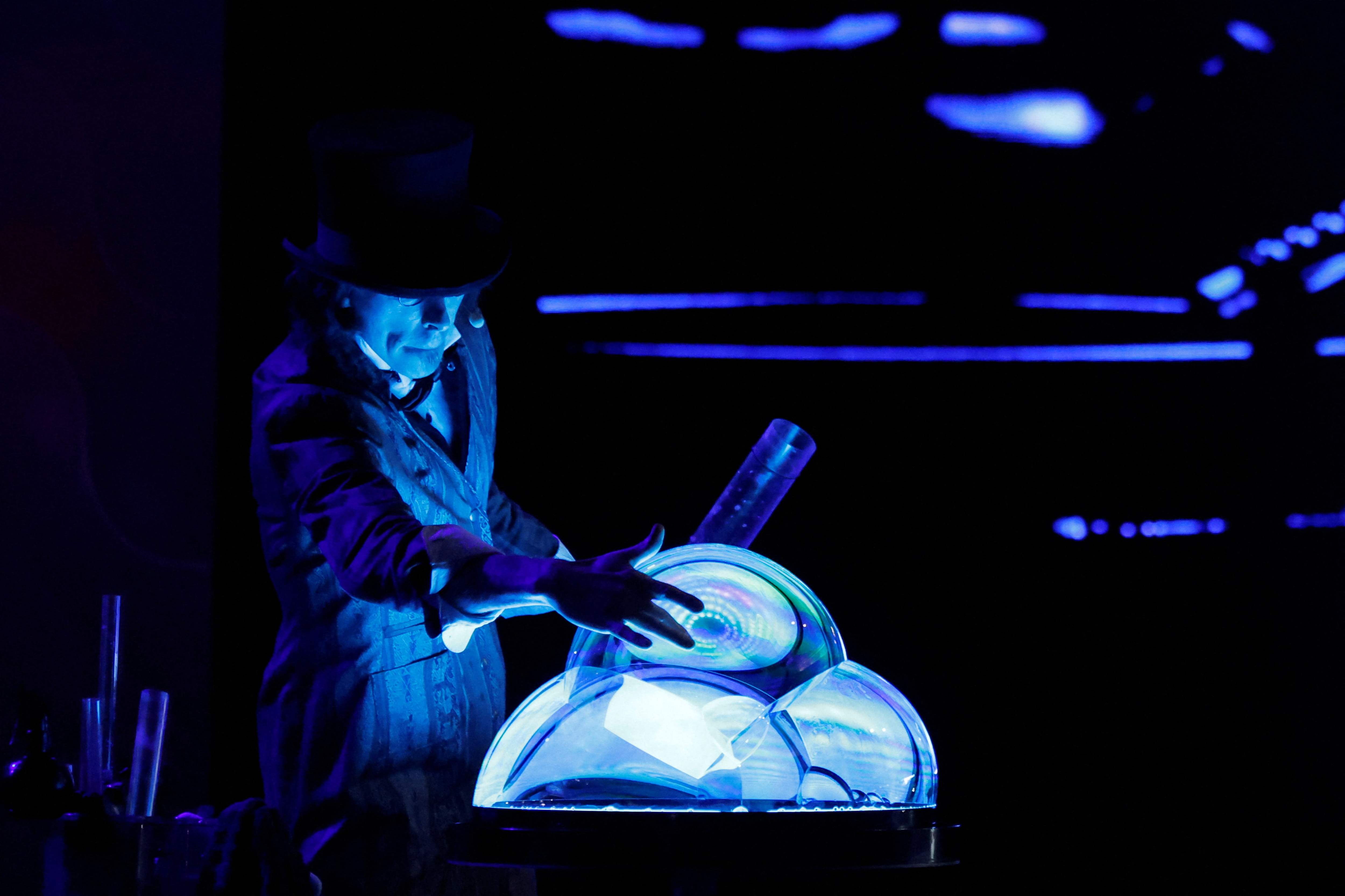A scientist in Ireland showcase a display about the science and structure of water. (Photo: Reuters)