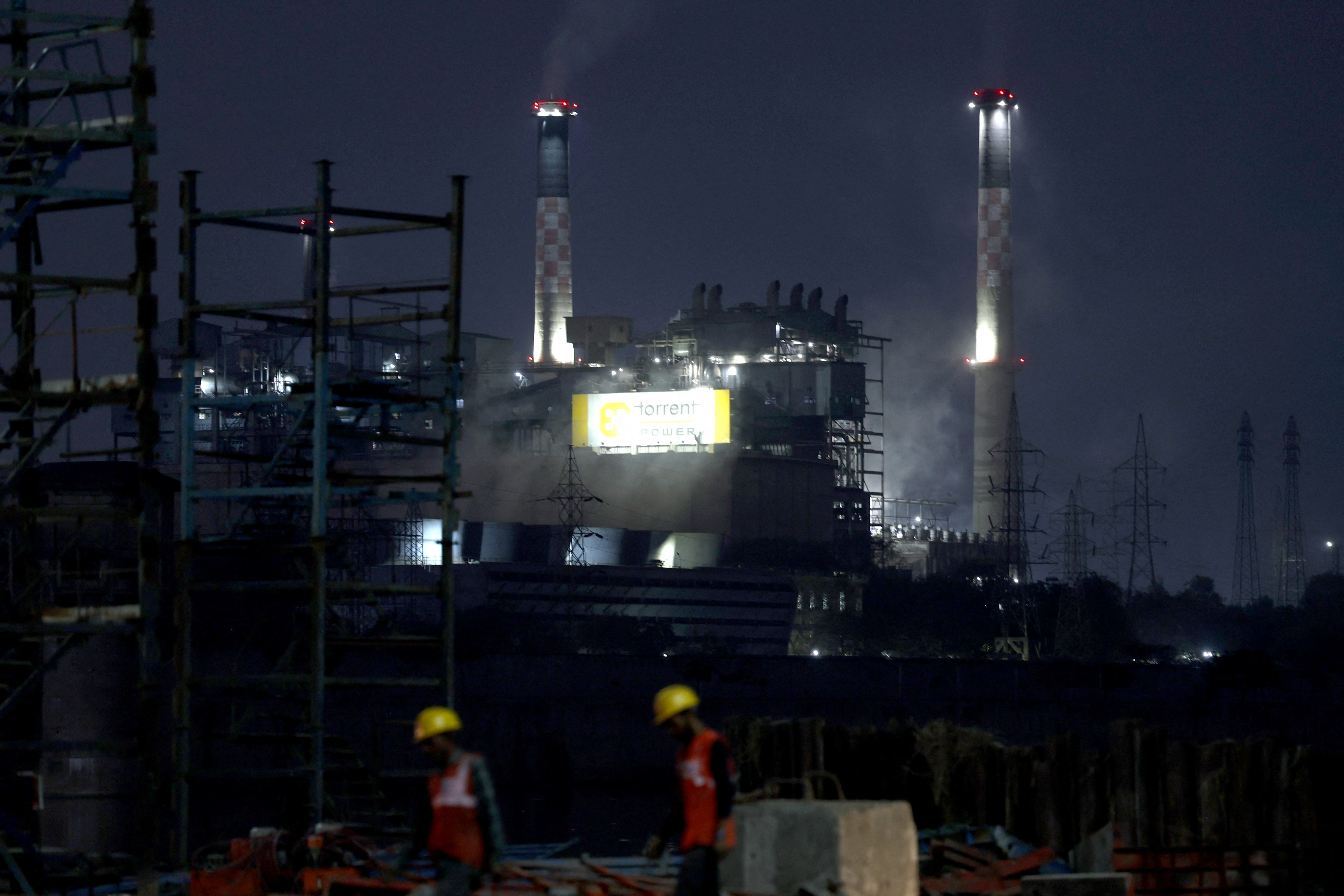 Smoke billows from the cooling towers of Torrent Power's coal-fired power plant in Ahmedabad. (Photo: Reuters)