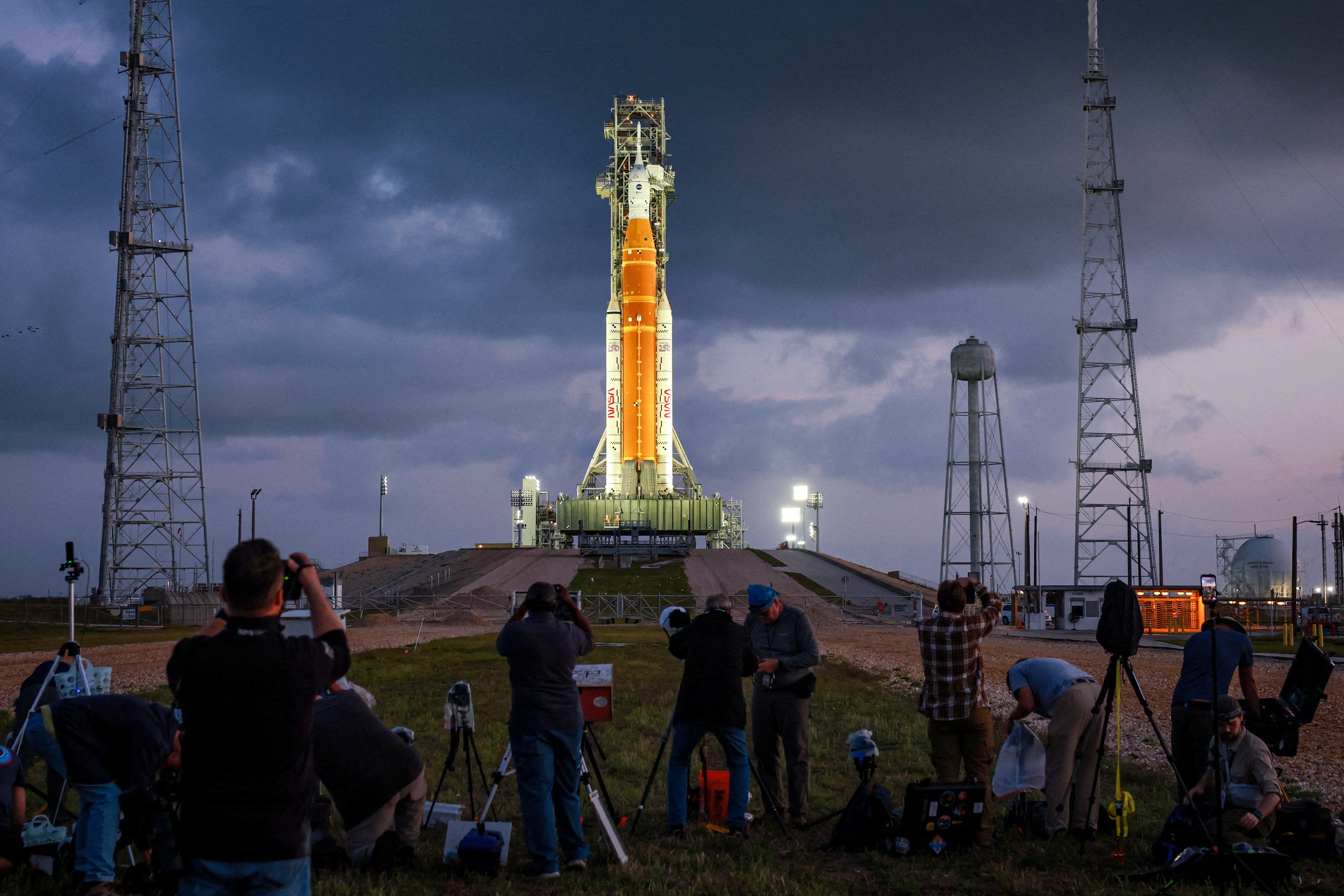 People set cameras to photograph Nasa's Artemis-II lunar flyby mission. (Photo: Reuters)