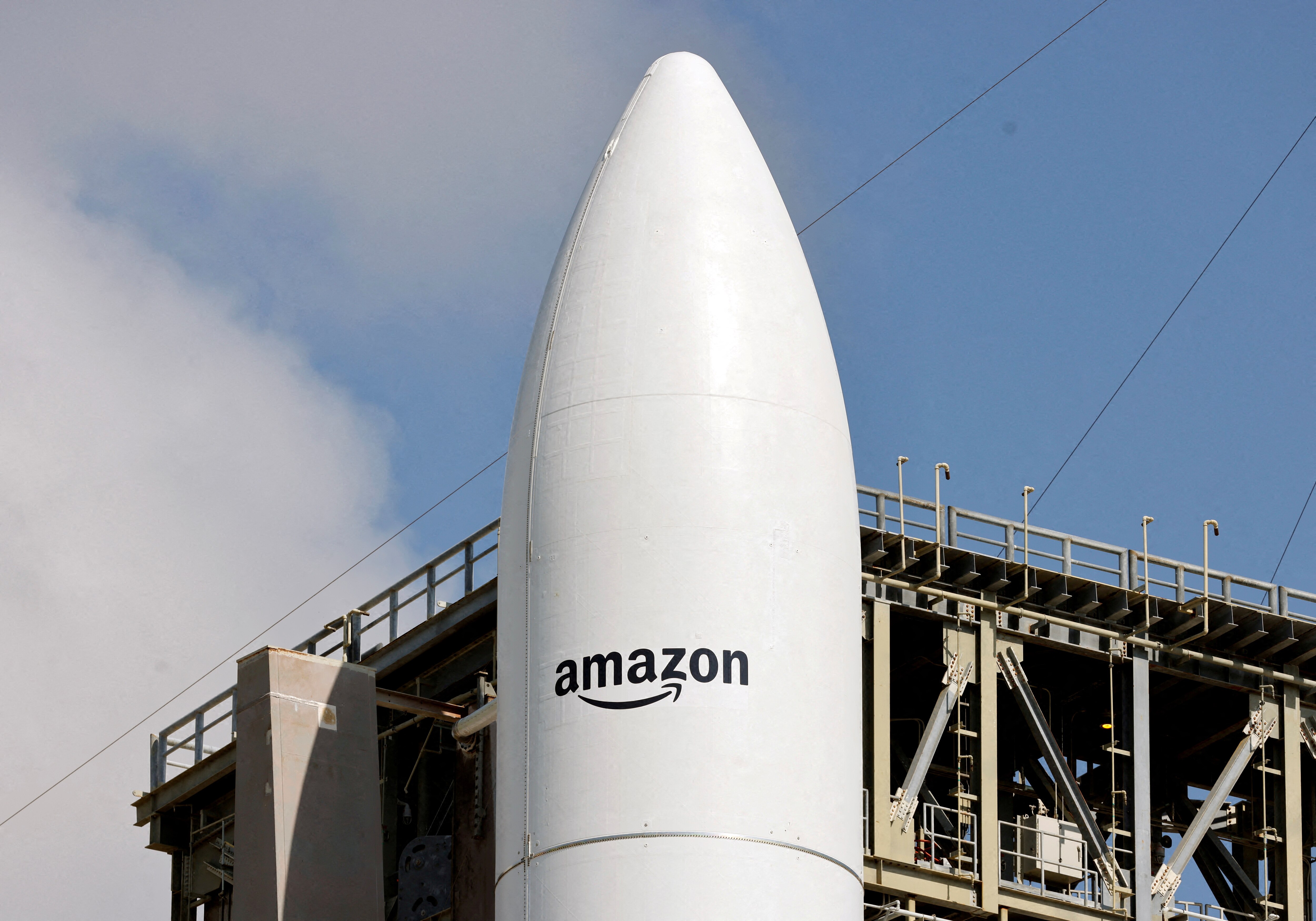A rocket is shown on its launch pad carrying Amazon's Project Kuiper internet network satellites. (Photo: Reuters)