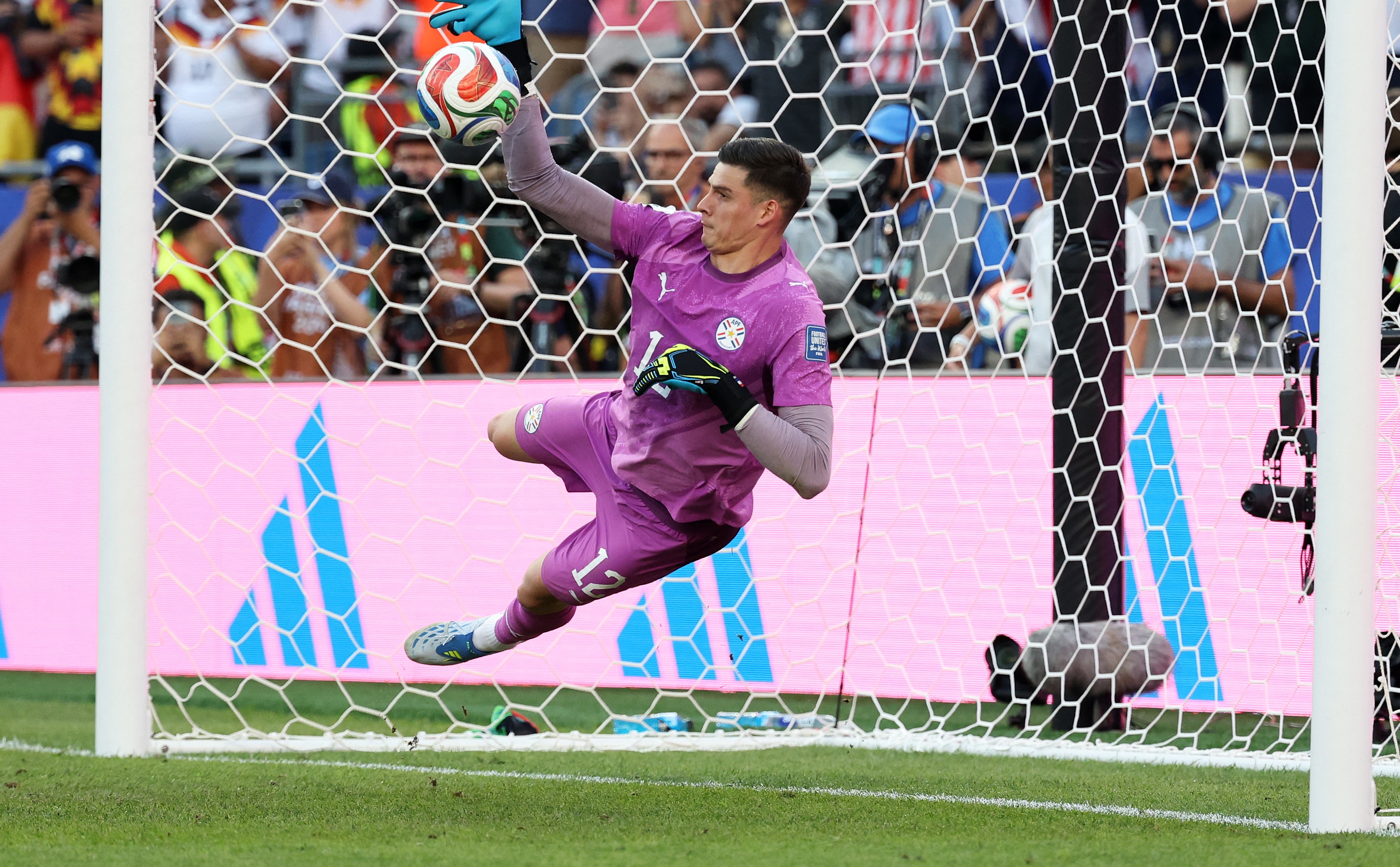 Paraguay's Orlando Gill saves a penalty missed by Germany's Kai Havertz. (Image: Reuters)