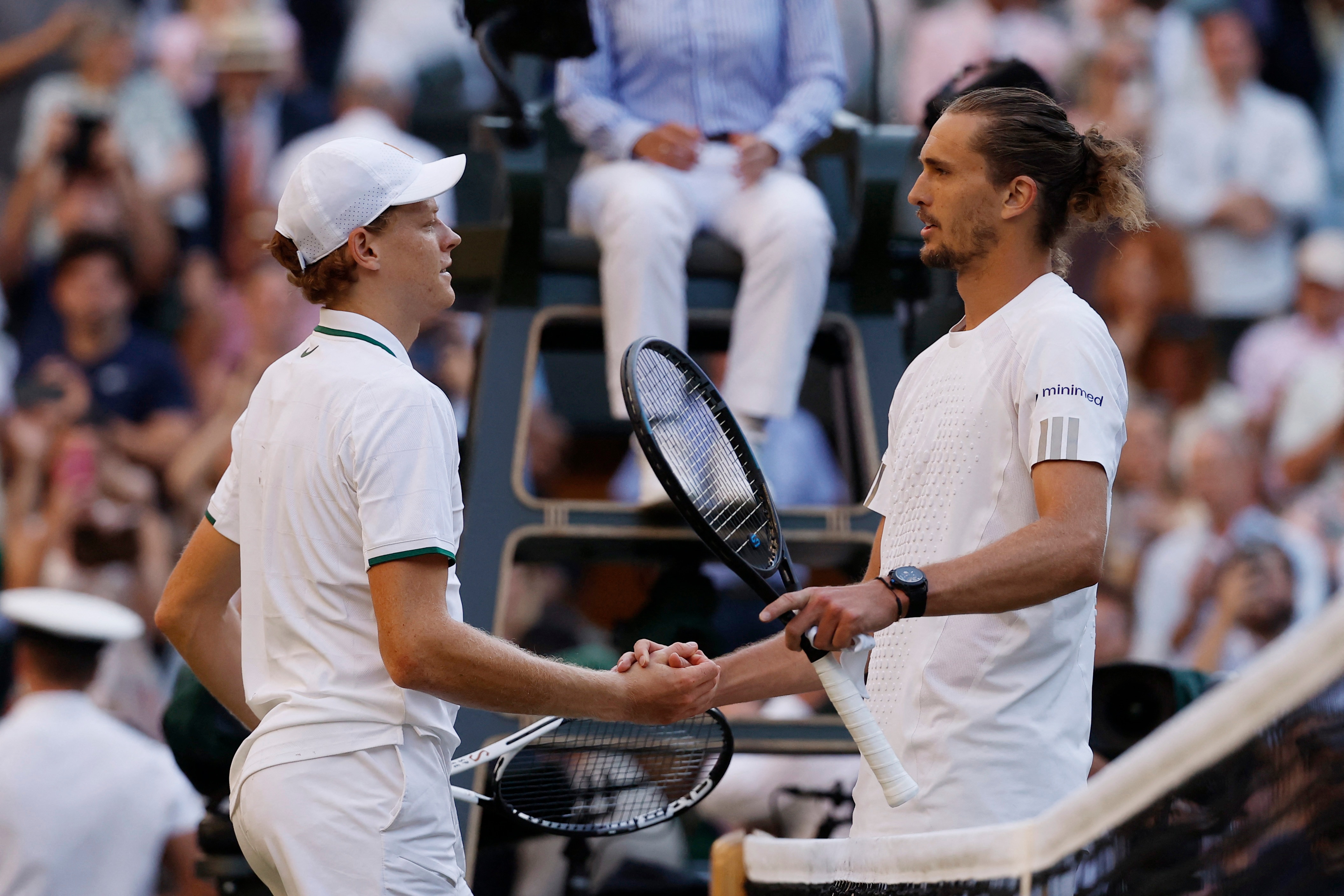 Jannik Sinner shakes hands with Alexander Zverev after winning the Wimbledon final. (Image: Reuters)
