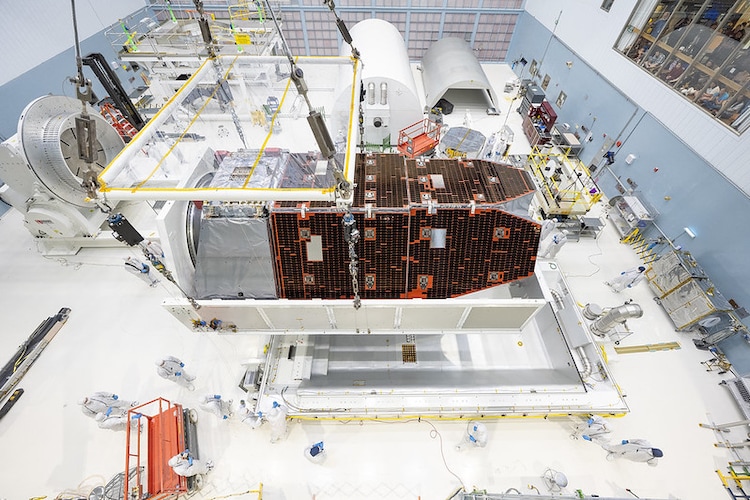 An aerial view of the Nancy Grace Roman Telescope as technicians work on it. (Photo: Nasa)
