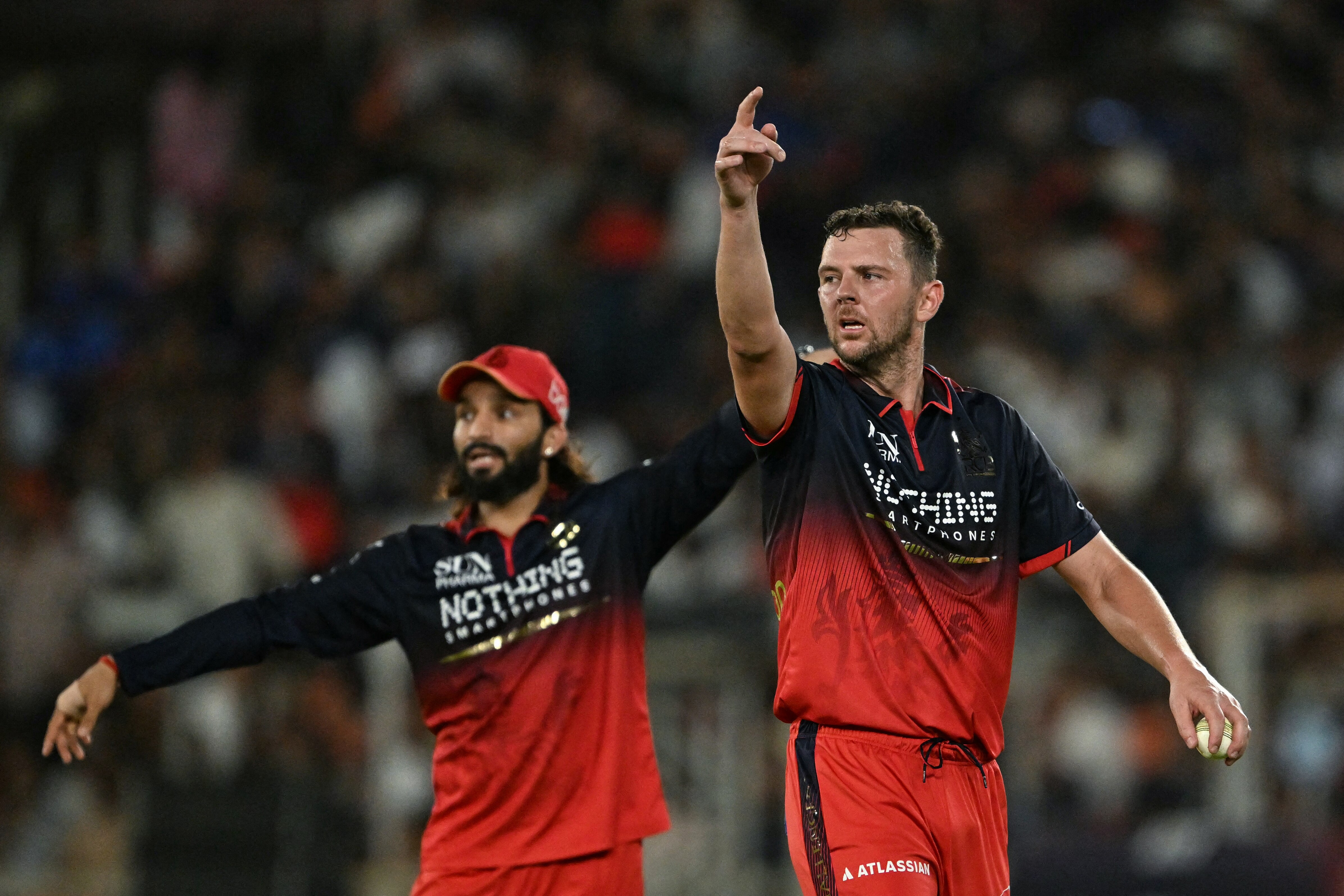 Rajat Patidar sets the field alongside Josh Hazlewood. (Image: AFP)