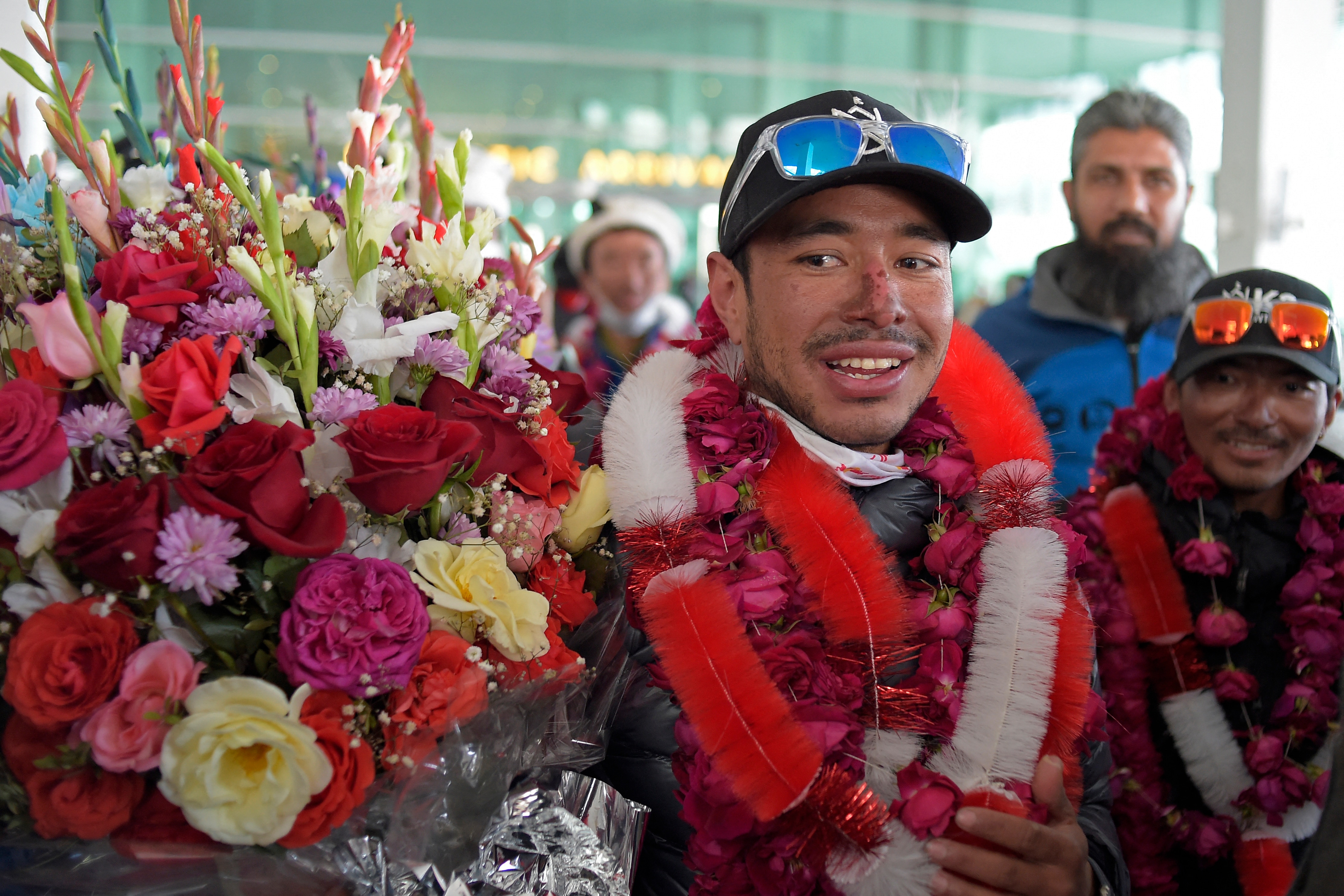 Nirmal Purja being welcomed after successfully climing K2 during winters. (Photo: AFP)