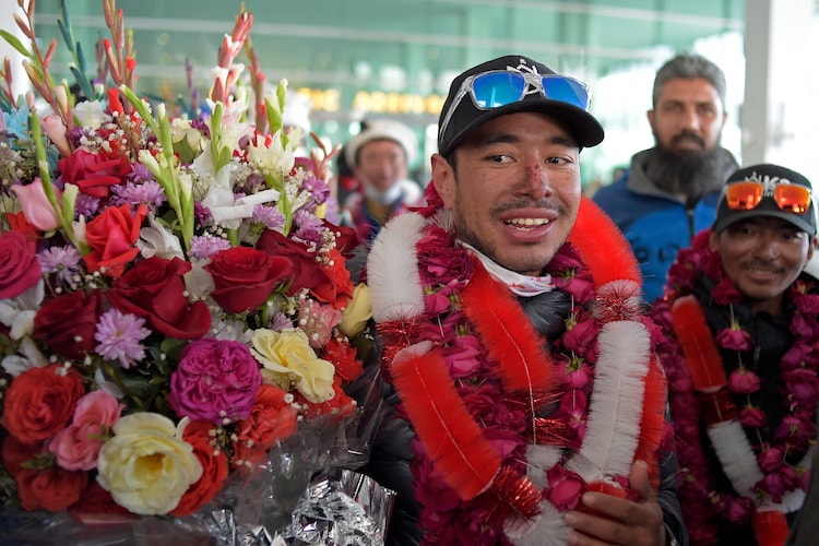 Nirmal Purja being welcomed after successfully climing K2 during winters. (Photo: AFP)