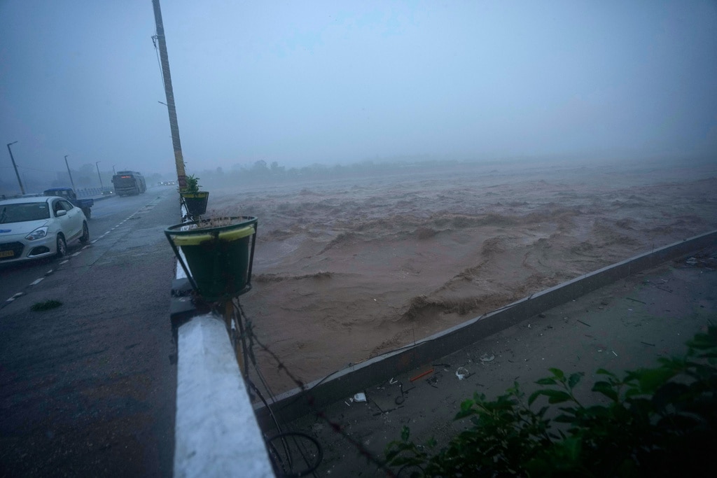 Water rose in Pakistan's Punjab province after India released waters from rivers. (Photo by AP)