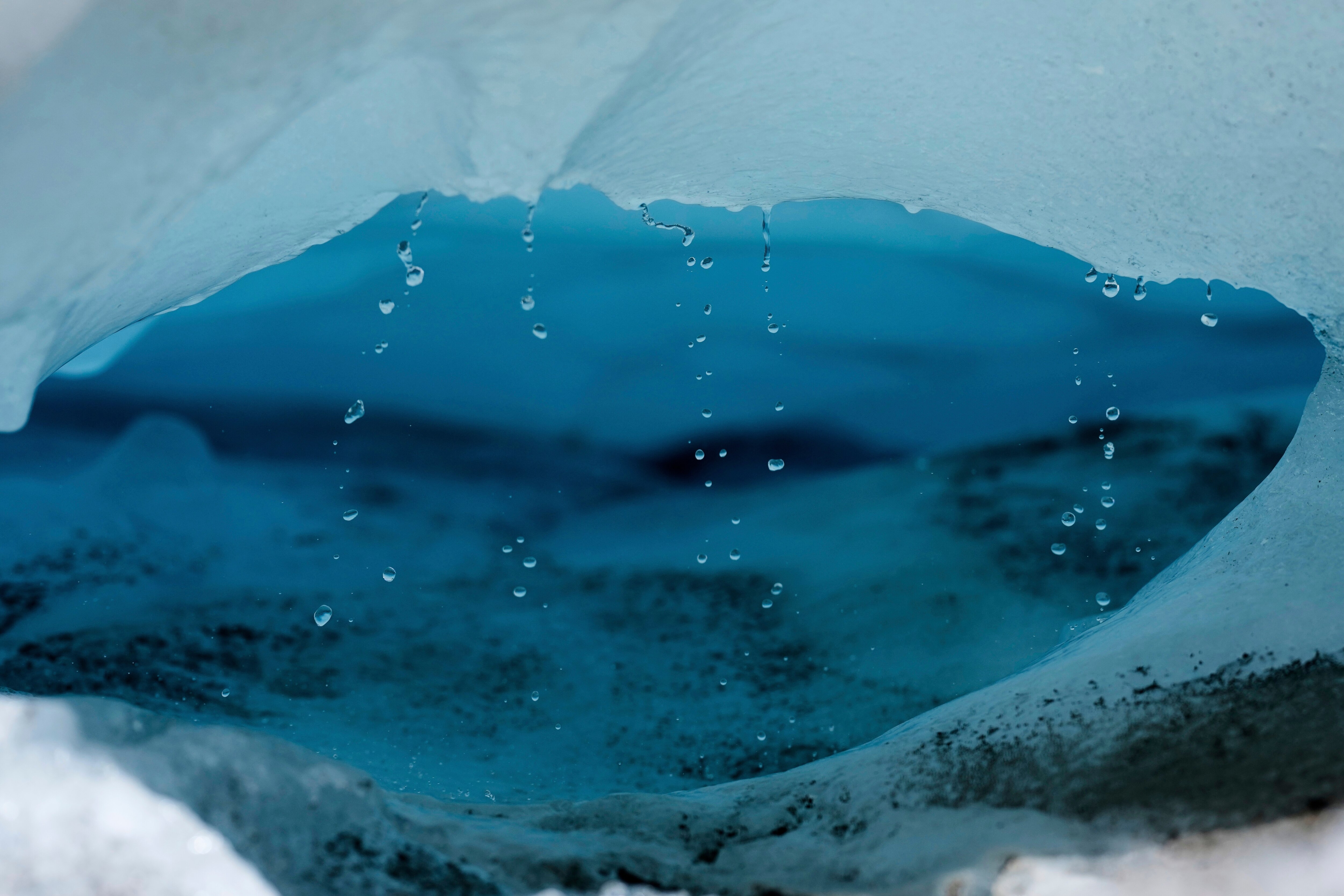 A piece of ice that originated from the Rhone Glacier is seen melting. (Photo: AP)