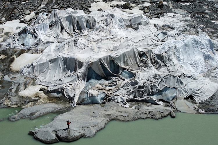 The Rhone Glacier in Switzerland is covered by sheets as GLAMOS monitors it. (Photo: AFP)