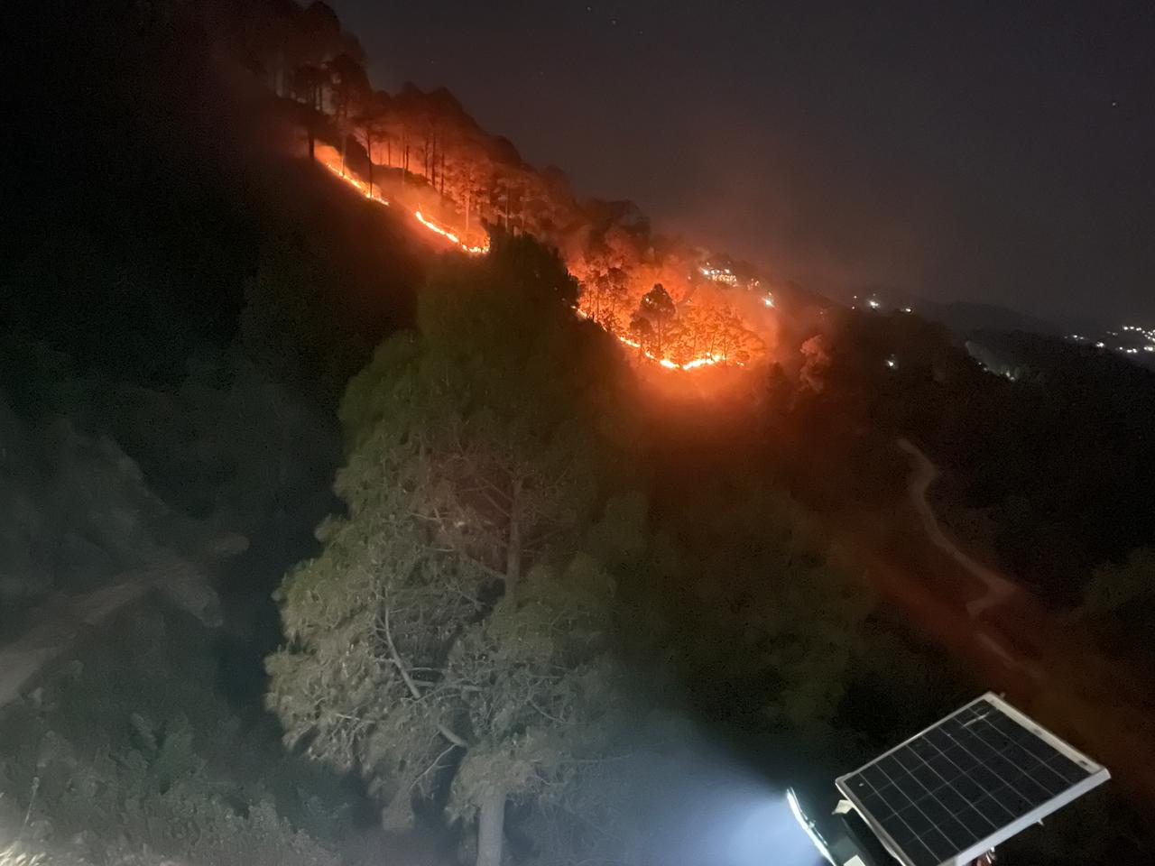 An image captured shows a forest fire in Uttarakhand. (Photo: X/@thepagetody)