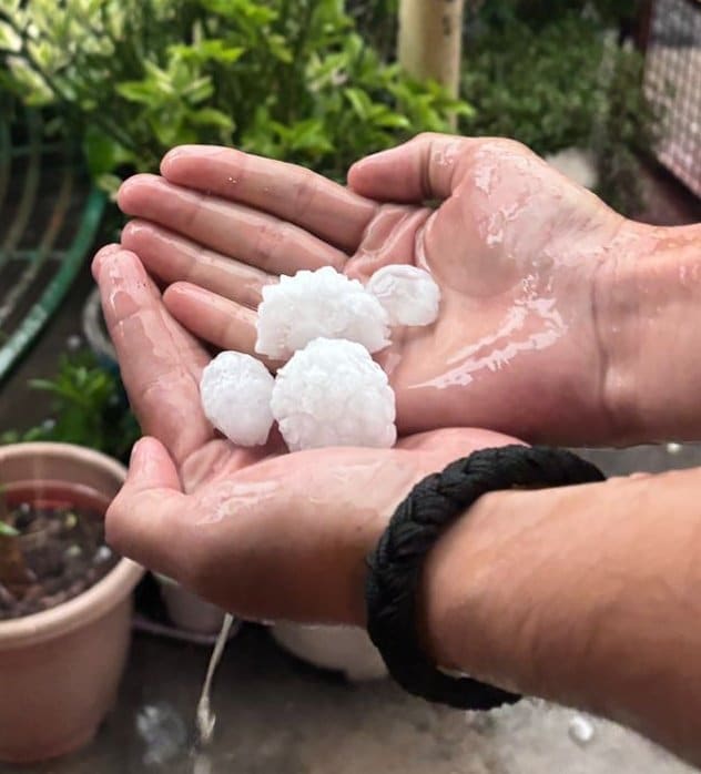 A person shows hail in Delhi. (Photo: X/@beatsinbrief)