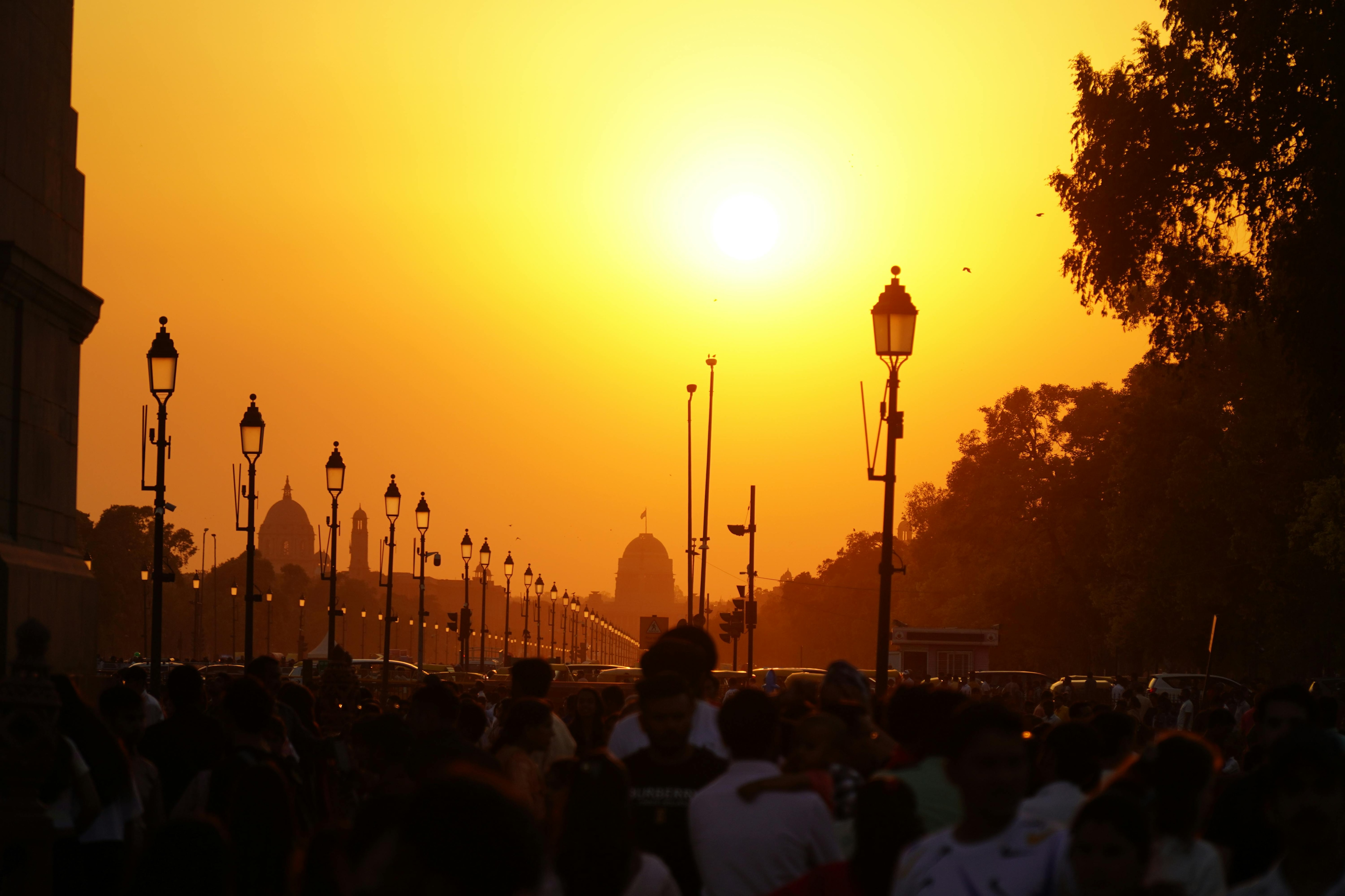 A view of a crowded Rajpath at sunset during a heatwave. (Photo: PTI)