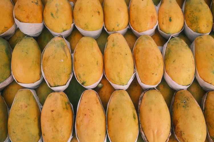 A display of ripe, yellow mangoes. (Photo: Pexels)