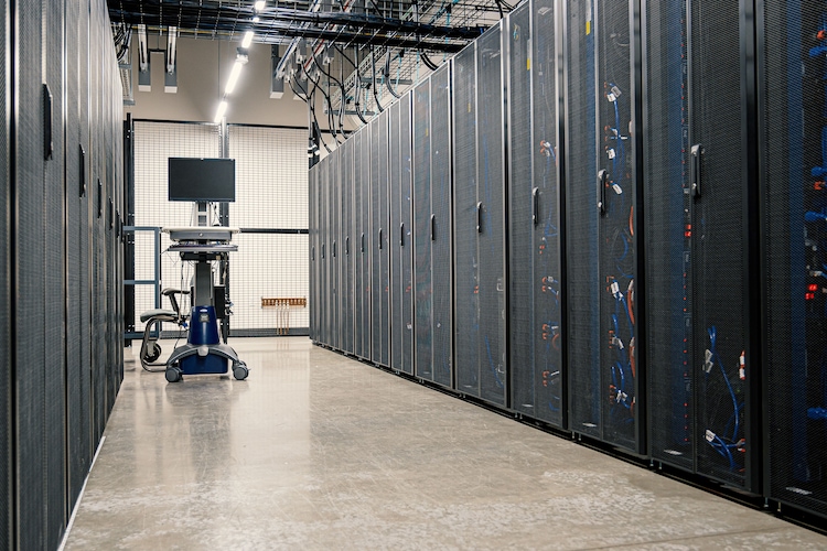 Servers networking devices and cables are seen in a data center. (Photo: Pexels)