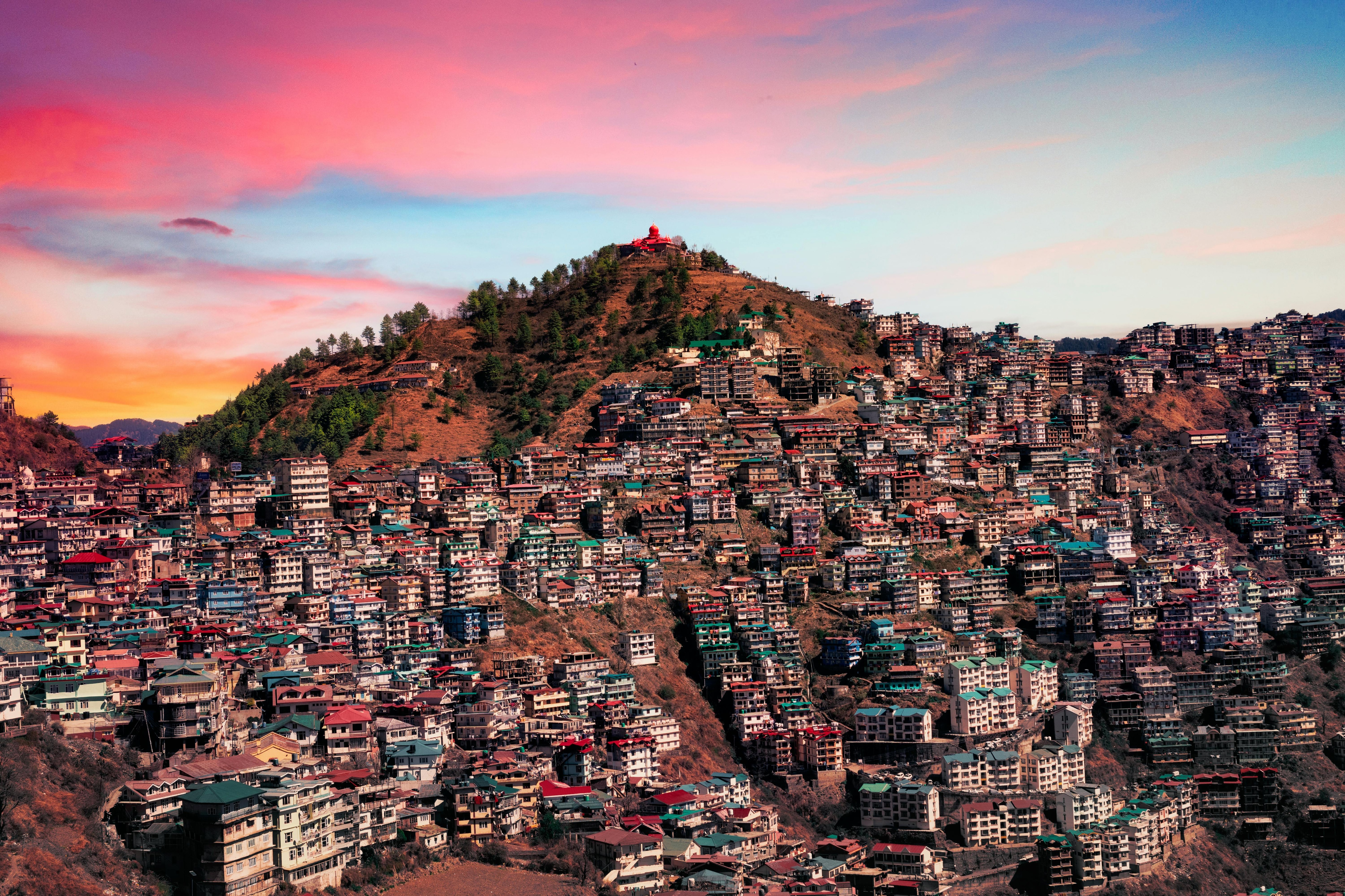 An aerial view of Shimla as the Sun sets in the background amid rising temperatures. (Photo: Pexels)