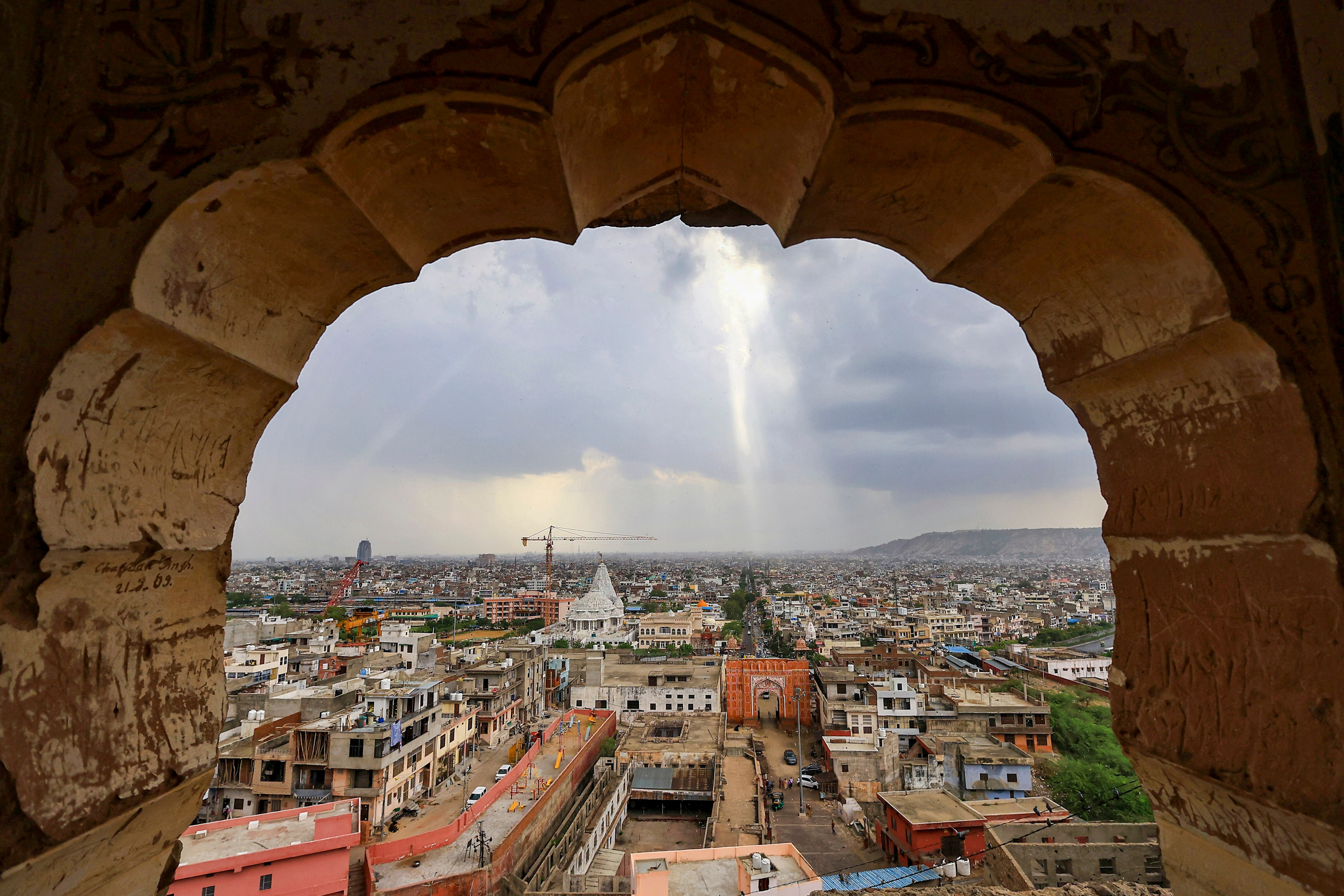 Monsoon clouds hover over Jaipur as rain sweeps across the city. (Photo: PTI)