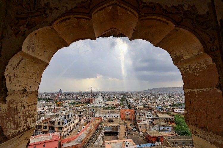 Monsoon clouds hover over Jaipur as rain sweeps across the city. (Photo: PTI)