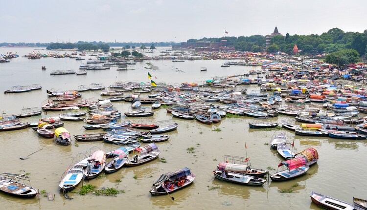 Boats are seen moored in swollen Ganga river following heavy rains. (Photo: PTI)