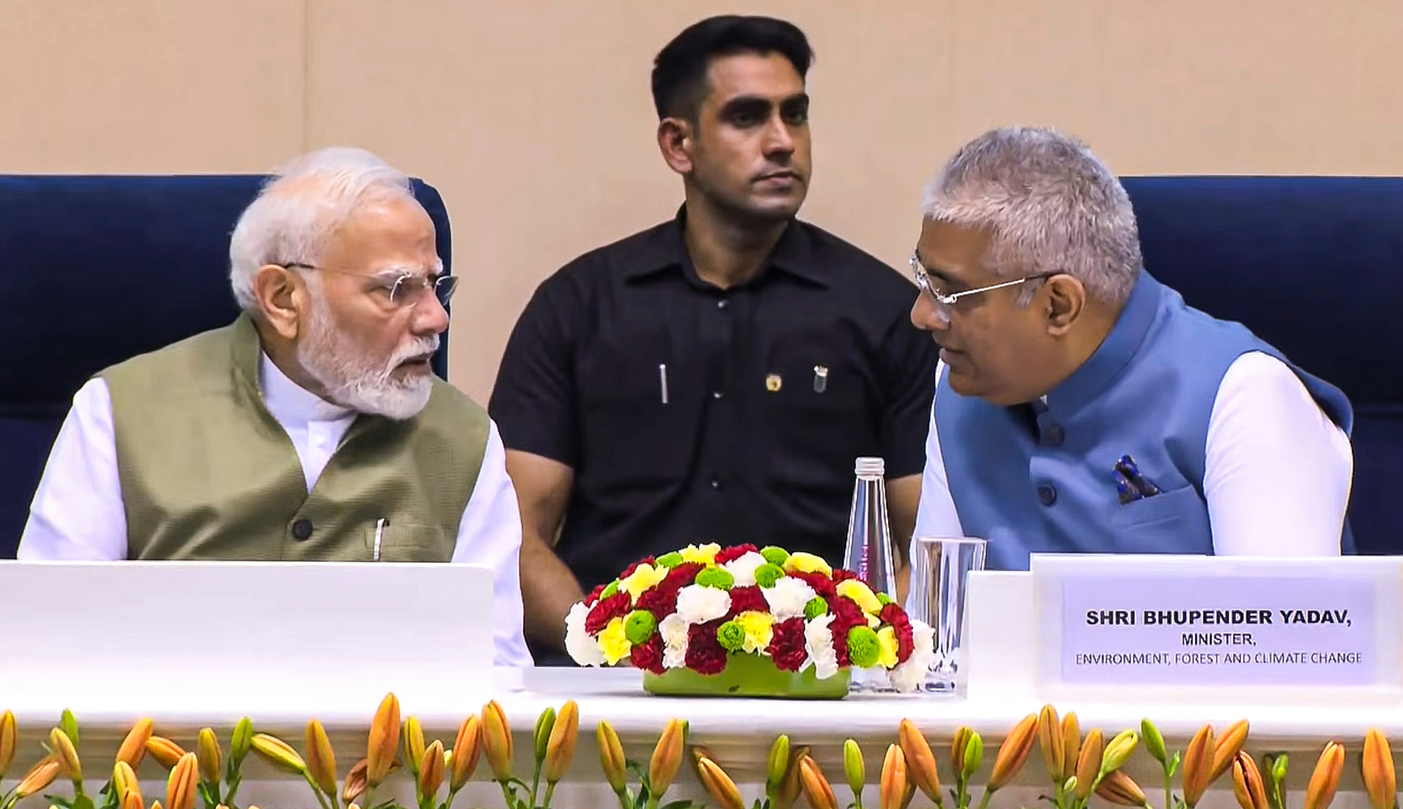 PM Narendra Modi in conversation with Union Environment, Forest and Climate Change Minister Bhupender Yadav at the International Conference on The Future of Environment and Climate Dynamics. (Photo: PTI/Screengrab)