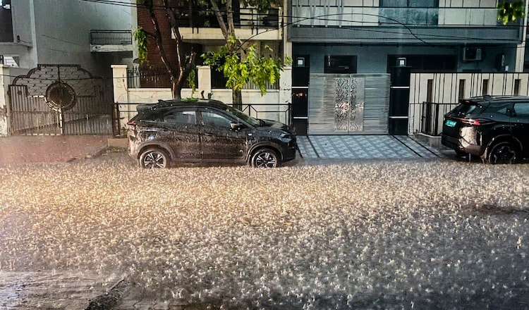 Hailstones fall during heavy rain in a residential area in Rewari, Haryana. (Photo: PTI)