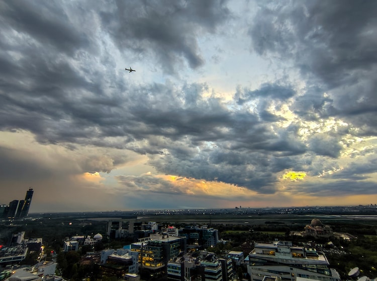 Rain clouds cover the skyline above Noida. (Photo: PTI)