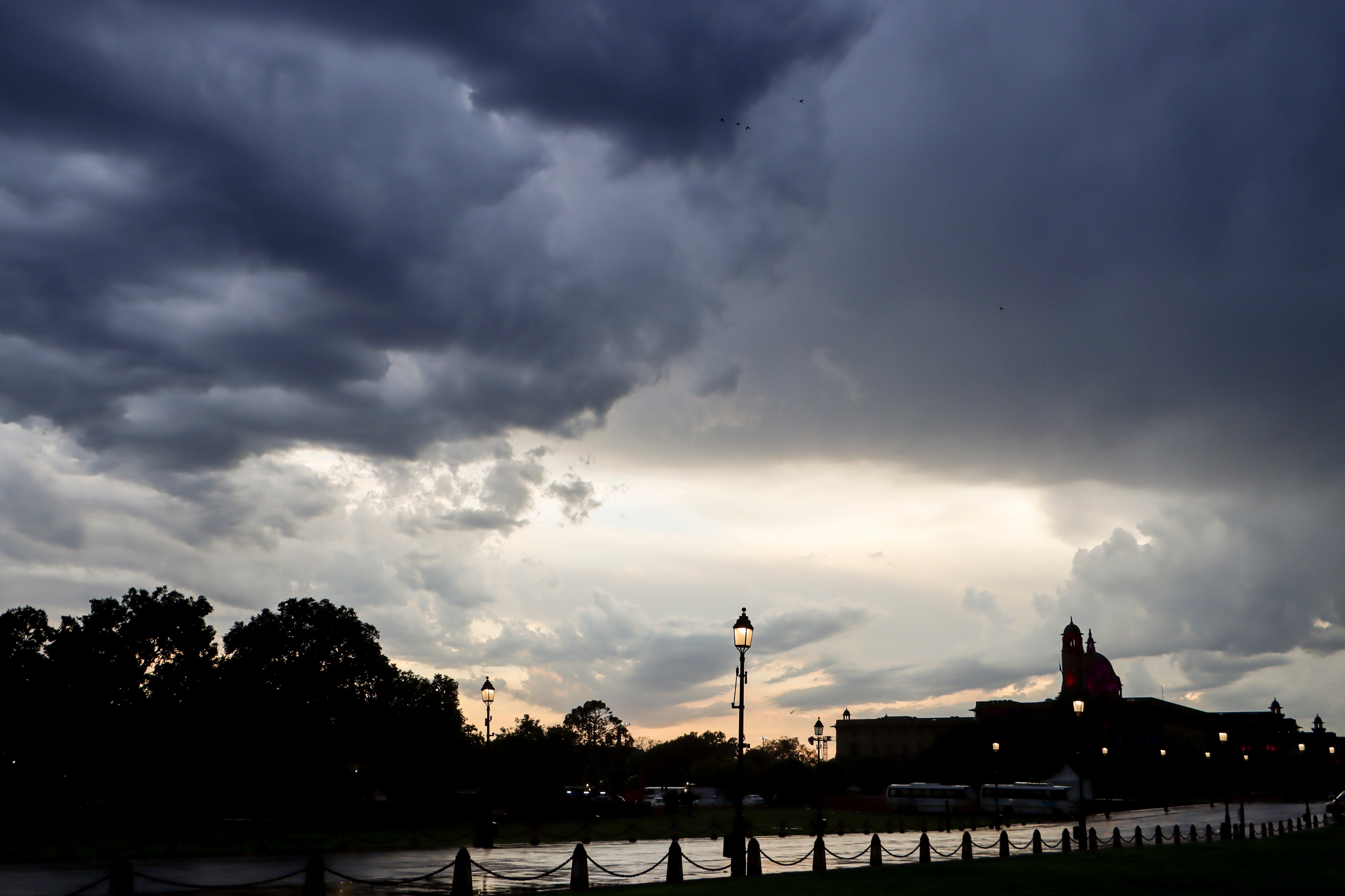 Rain clouds cover the skyline above New Delhi. (Photo: PTI)