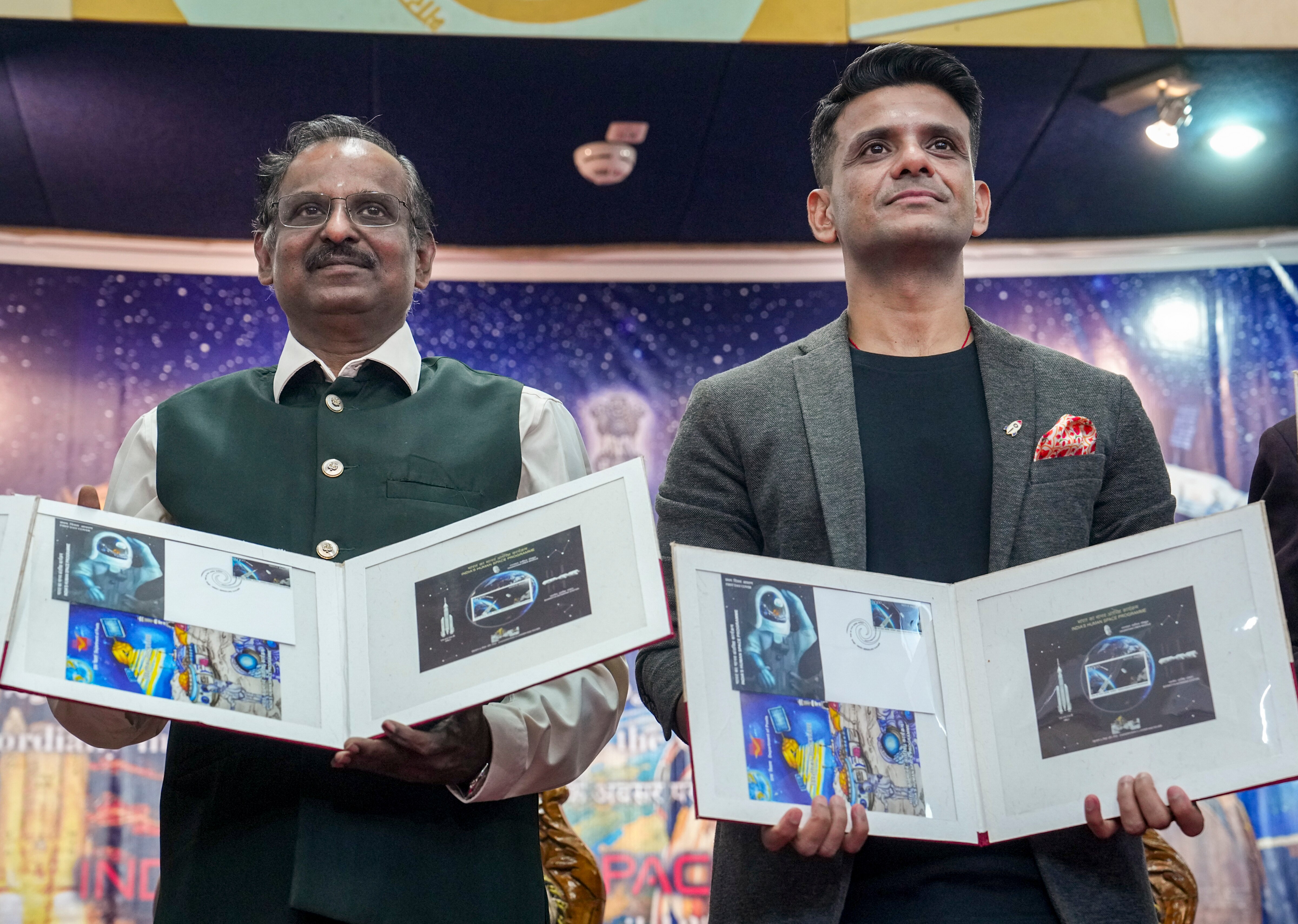 Isro Chairman V Narayanan with astronaut and IAF Group Captain Shubhanshu Shukla. (Photo: PTI)Isro Chairman V Narayanan with astronaut and IAF Group Captain Shubhanshu Shukla. (Photo: PTI)Isro Chairman V Narayanan with astronaut and IAF Group Captain Shubhanshu Shukla. (Photo: PTI)