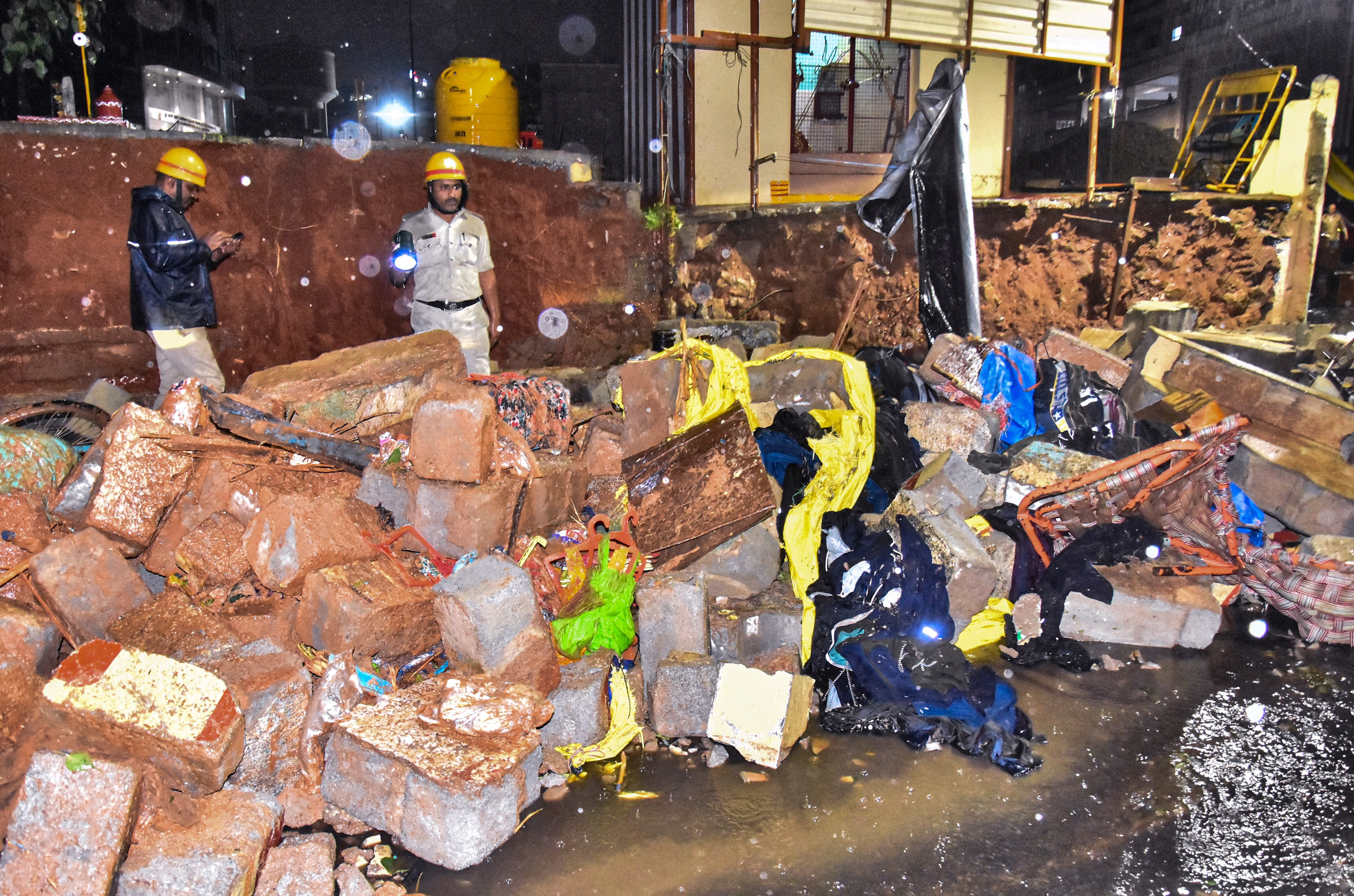 The site after a wall collapse following heavy rain, at Bowring Hospital, in Bengaluru. (Photo: PTI)