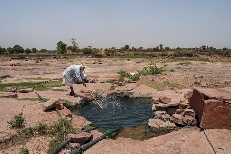 A borewell brimming with water after years of community-led water conservation. (Photo: PTI)