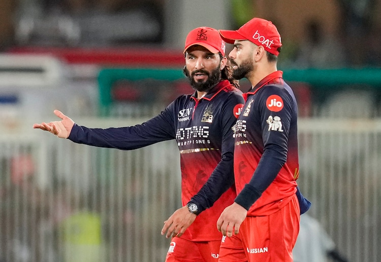 Rajat Patidar in conversation with Virat Kohli. (Image: PTI)