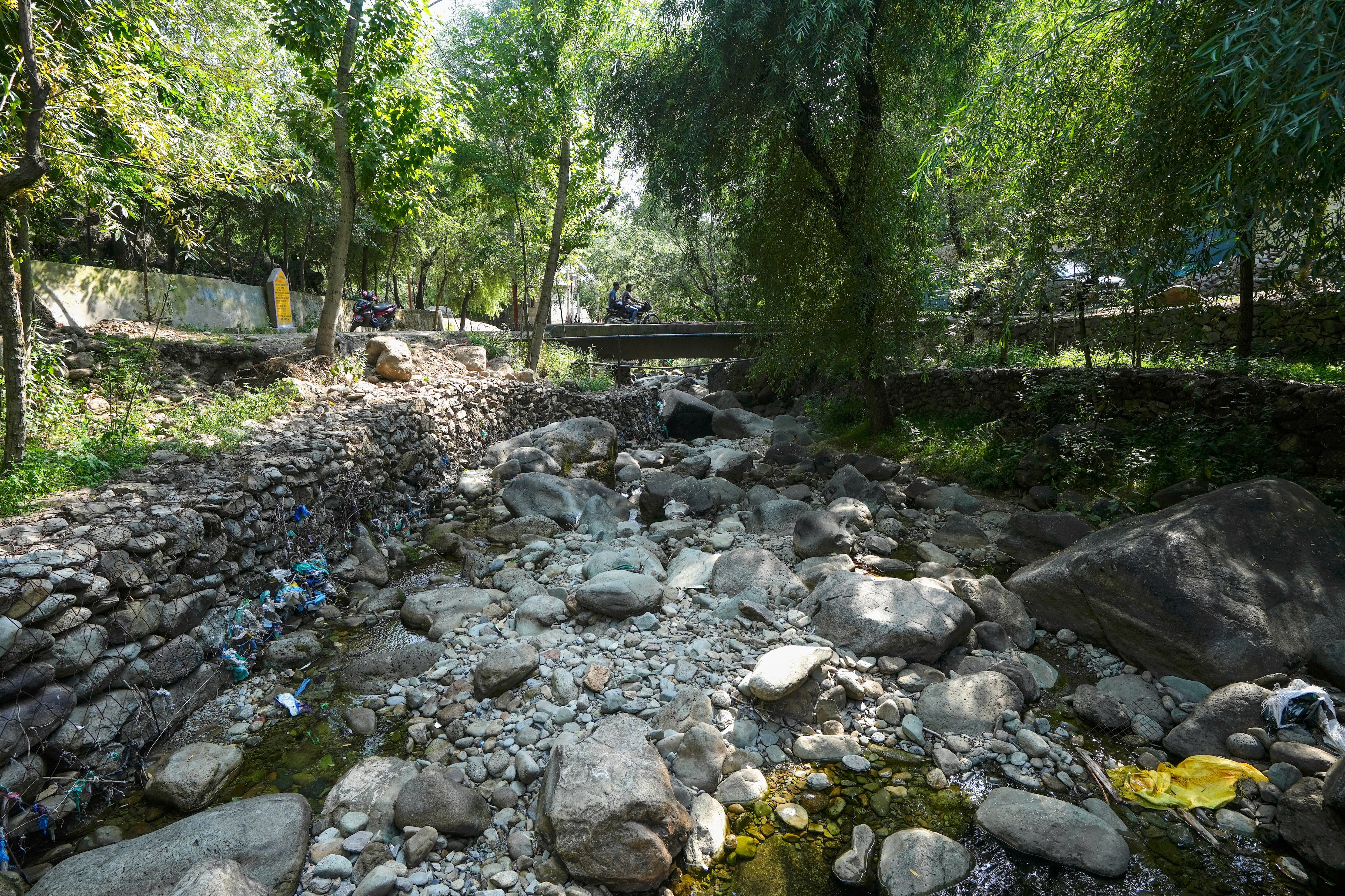 A dried up stream on the outskirts of Srinagar during a drought. (Photo: PTI)