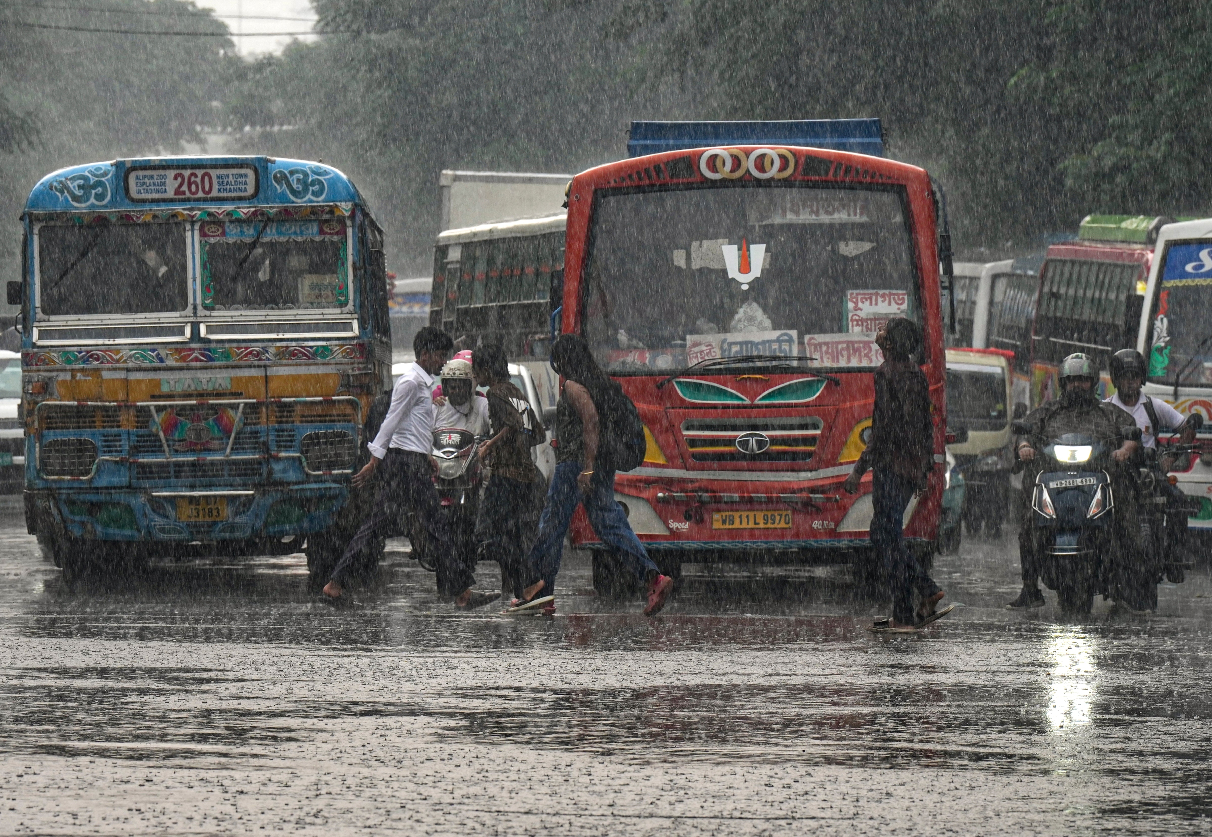 Vehicles ply amid heavy rain. (Photo: PTI)