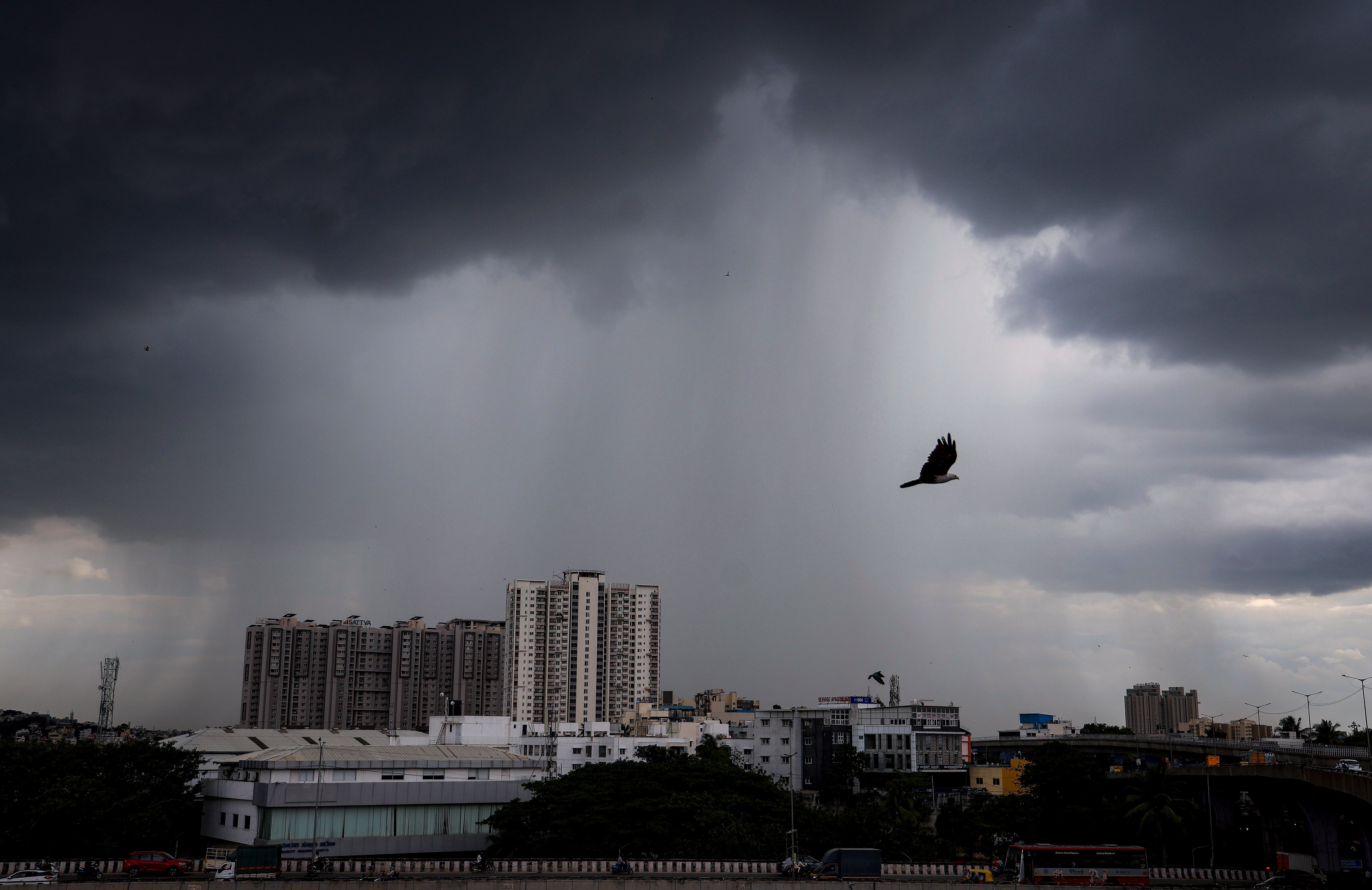 Dark monsoon clouds gather over the city as rain lashes parts of Bengaluru. (Photo: PTI)