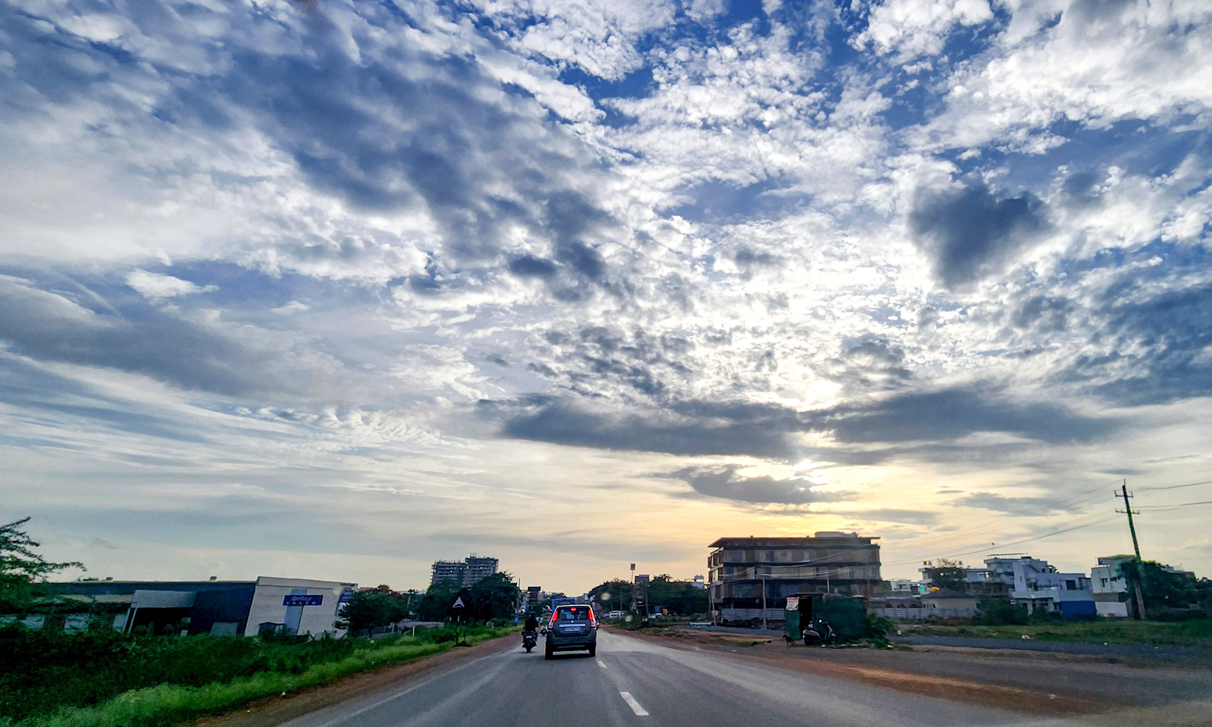 Clouds fill the sky over a road after rain. (Photo: PTI)
