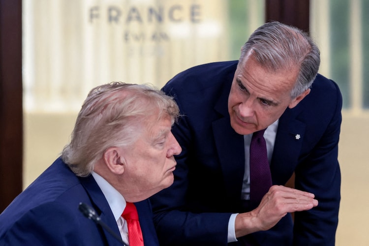 Donald Trump speaks with Canadian Prime Minister Mark Carney. (Photo: Reuters)