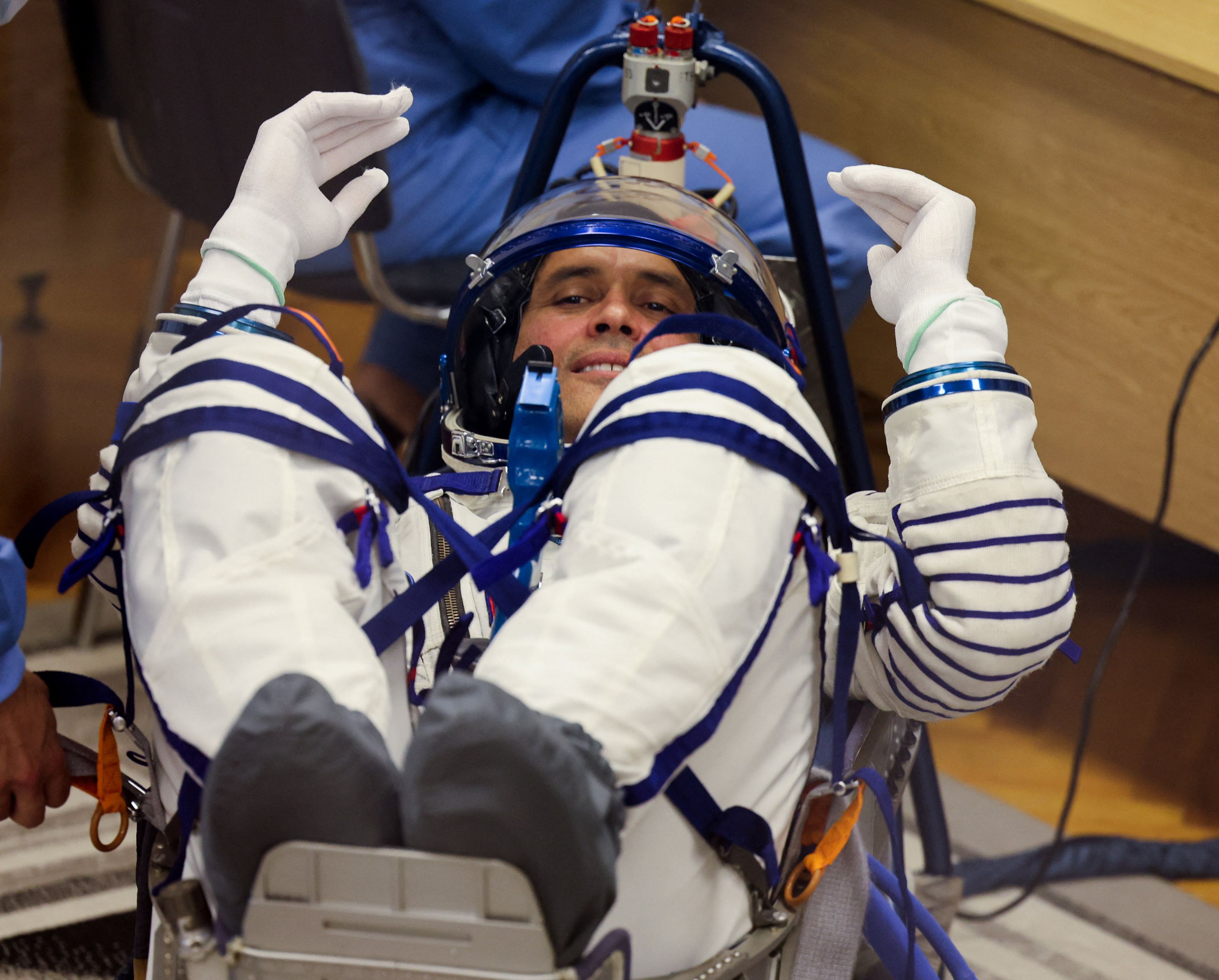 Anil Menon is pictured during a check of his spacesuit befire launch to the ISS. (Photo: Reuters)