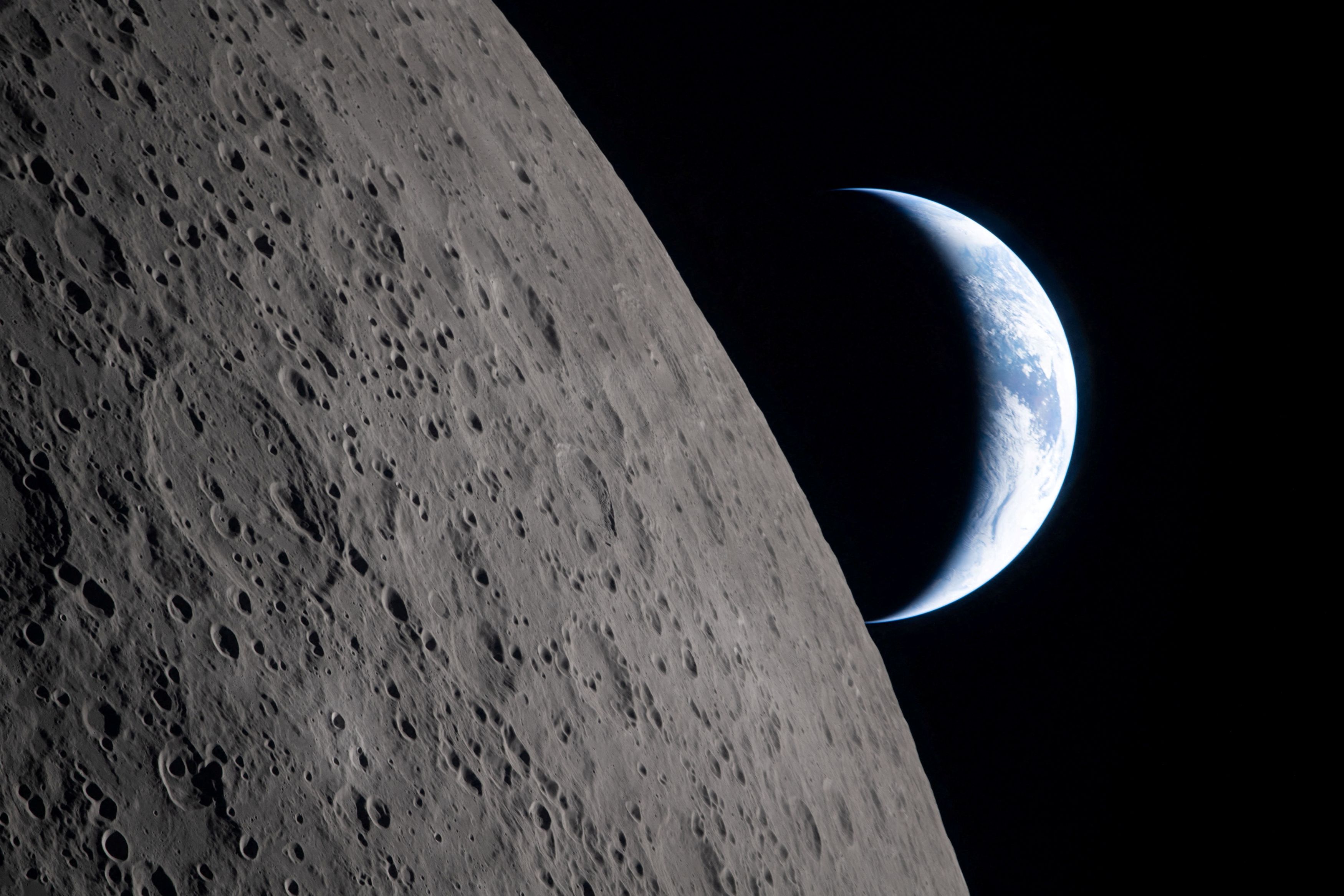 A view of Earth, partially hidden by the Moon, photographed from the Orion spacecraft. (Photo: Nasa)