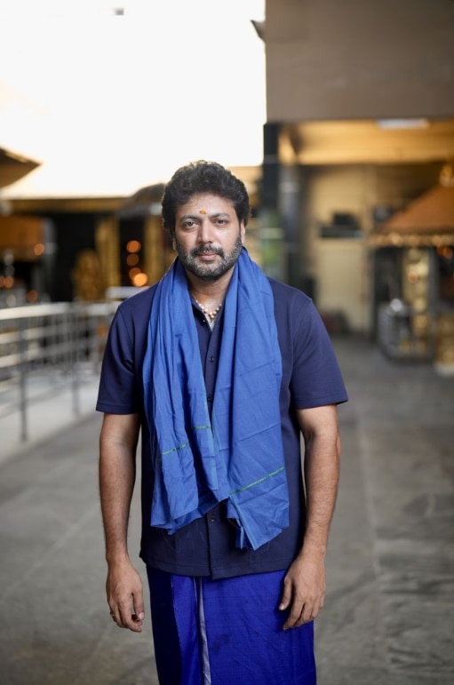Ravi Mohan wearing the sacred beads and thread in preparation of the pilgrimage